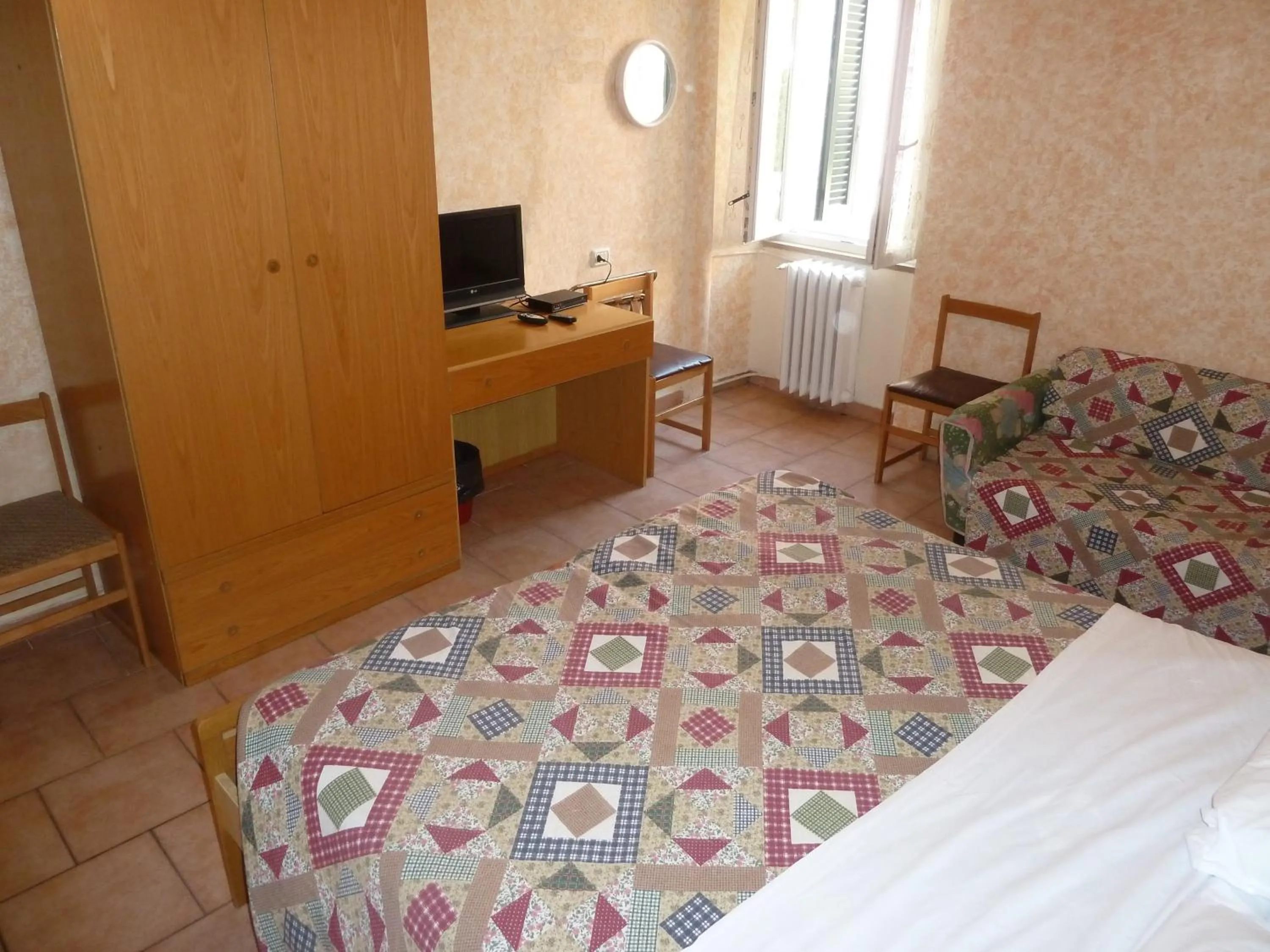 Bed in Hotel Bolognese