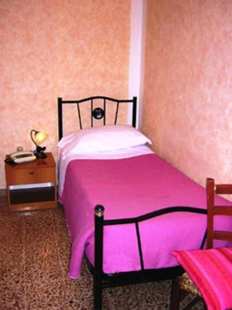 Bed in Hotel Bolognese