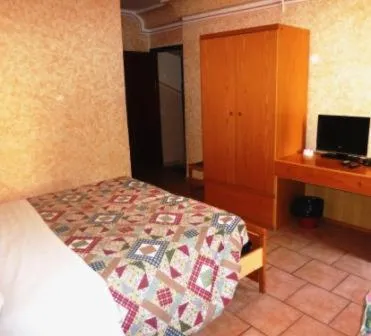 Bed in Hotel Bolognese