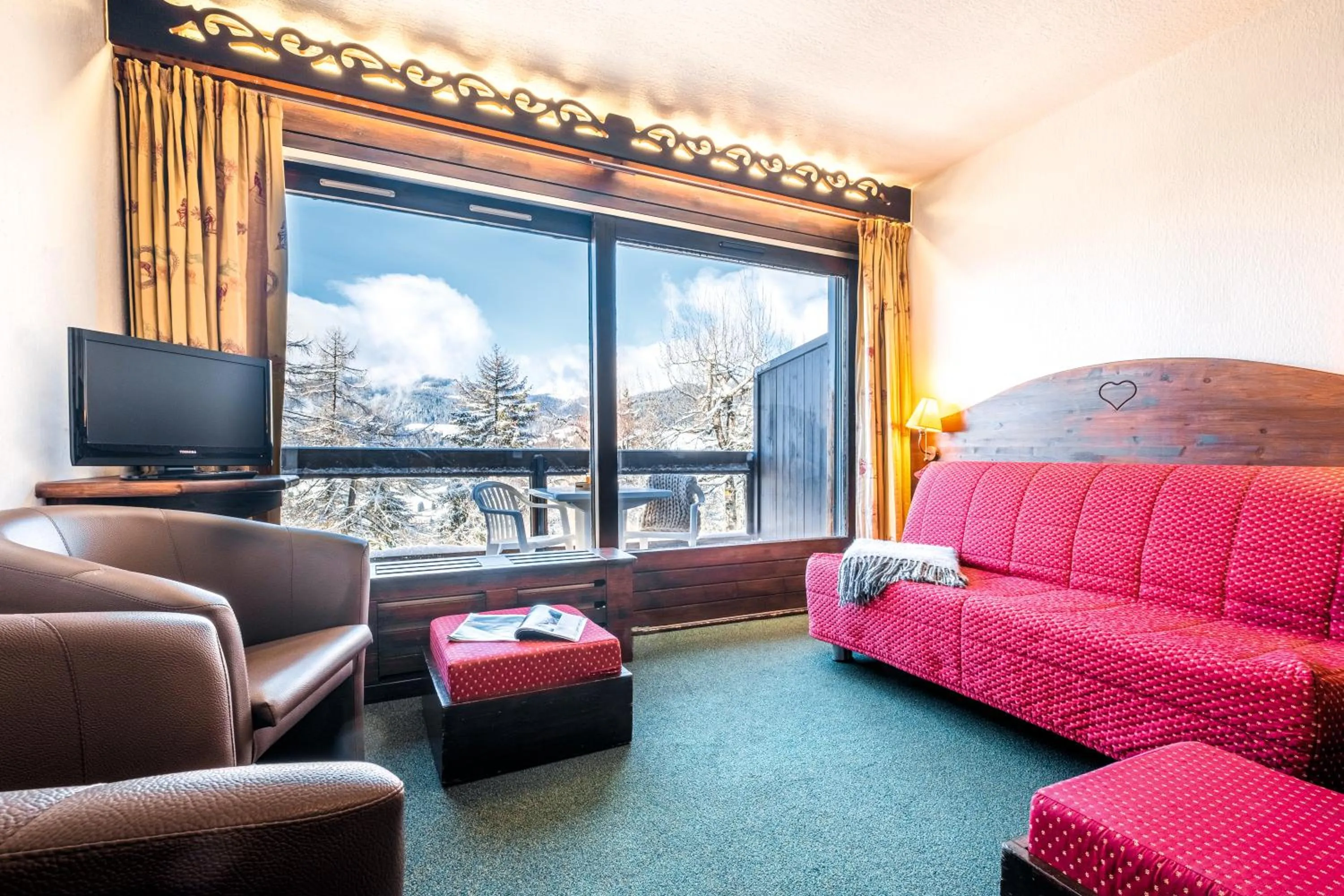 Communal lounge/ TV room in Résidence Pierre & Vacances Le Mont d'Arbois