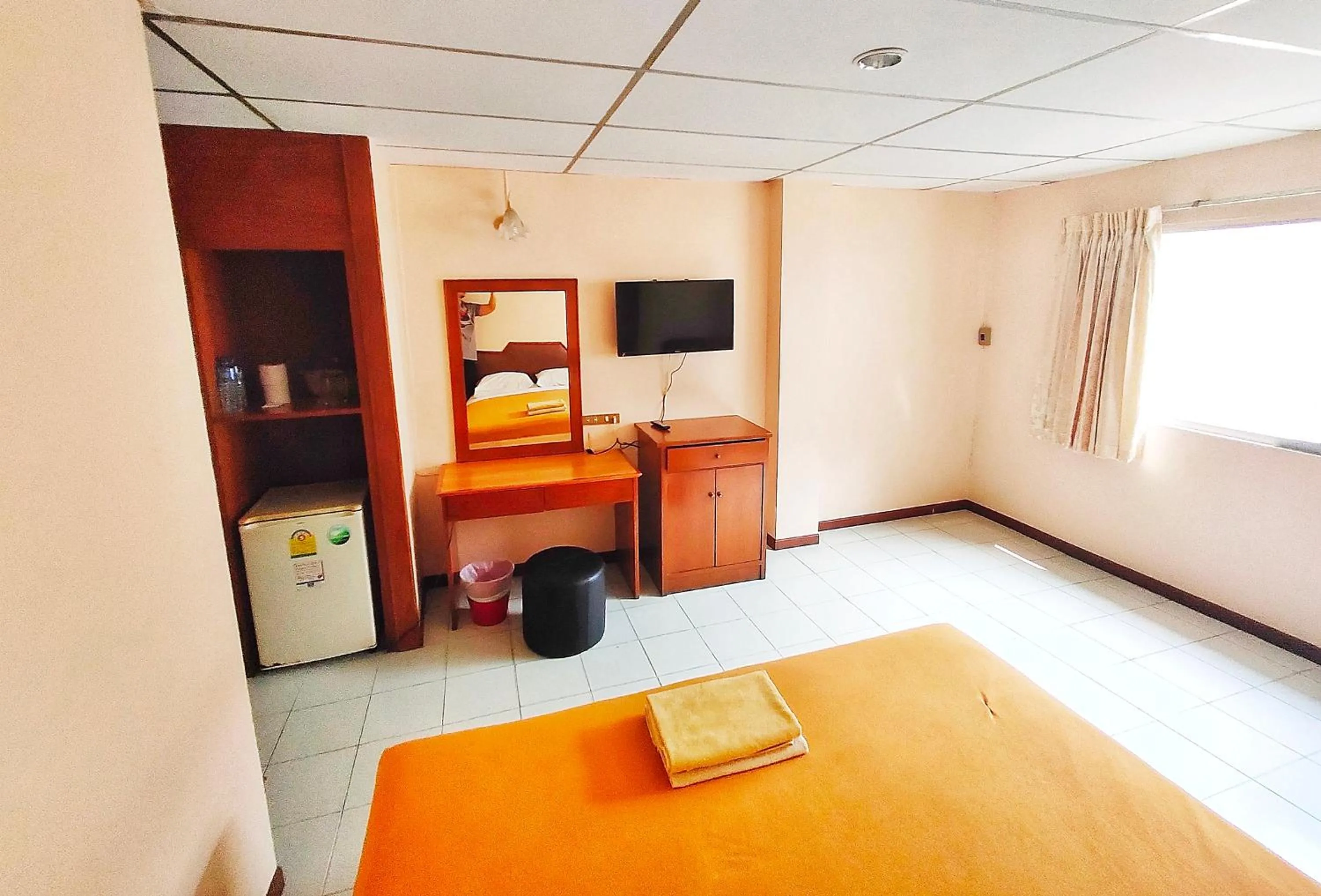 Bed in Top Thai Hotel