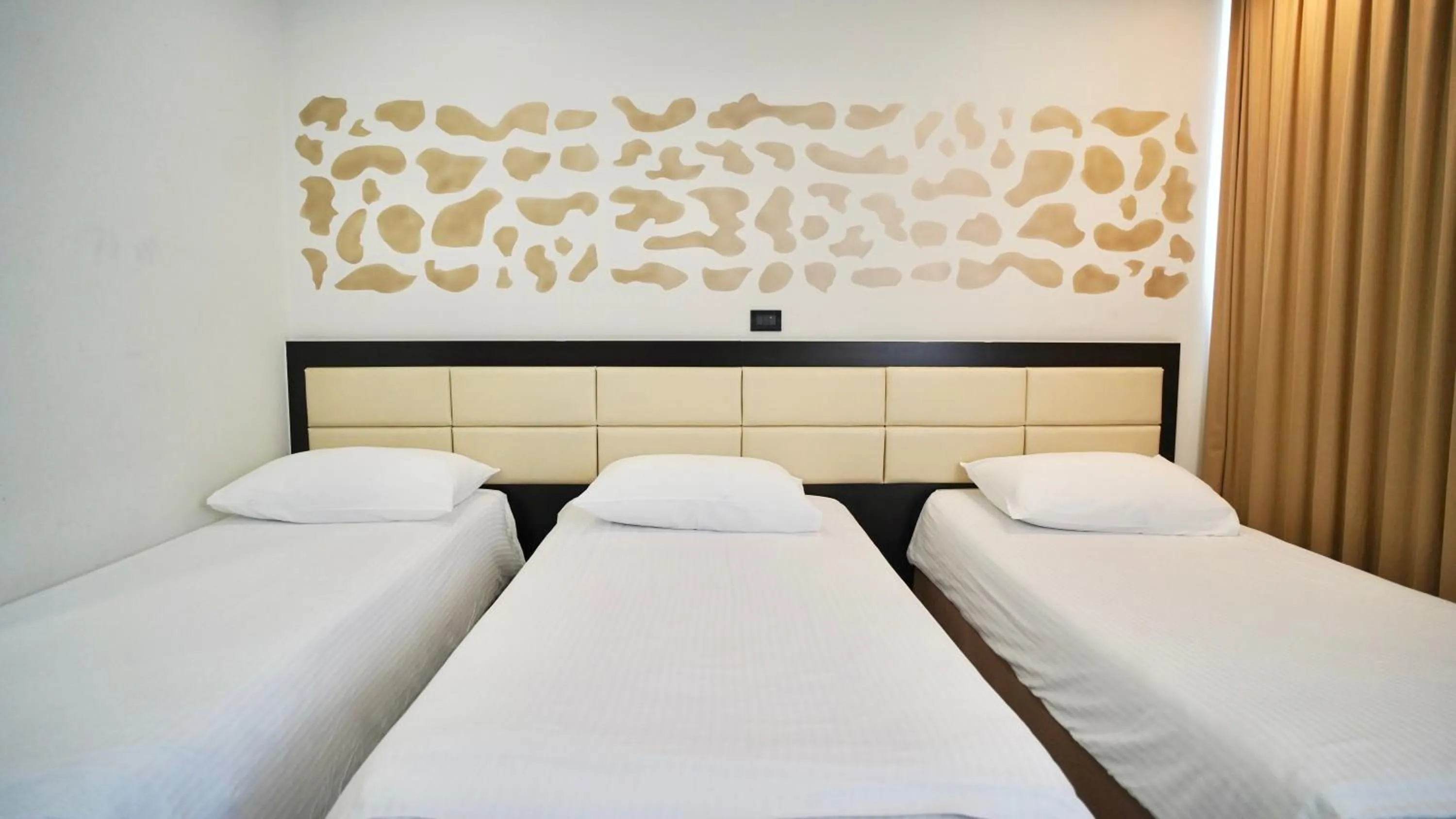 Bed in Hotel Diplomat