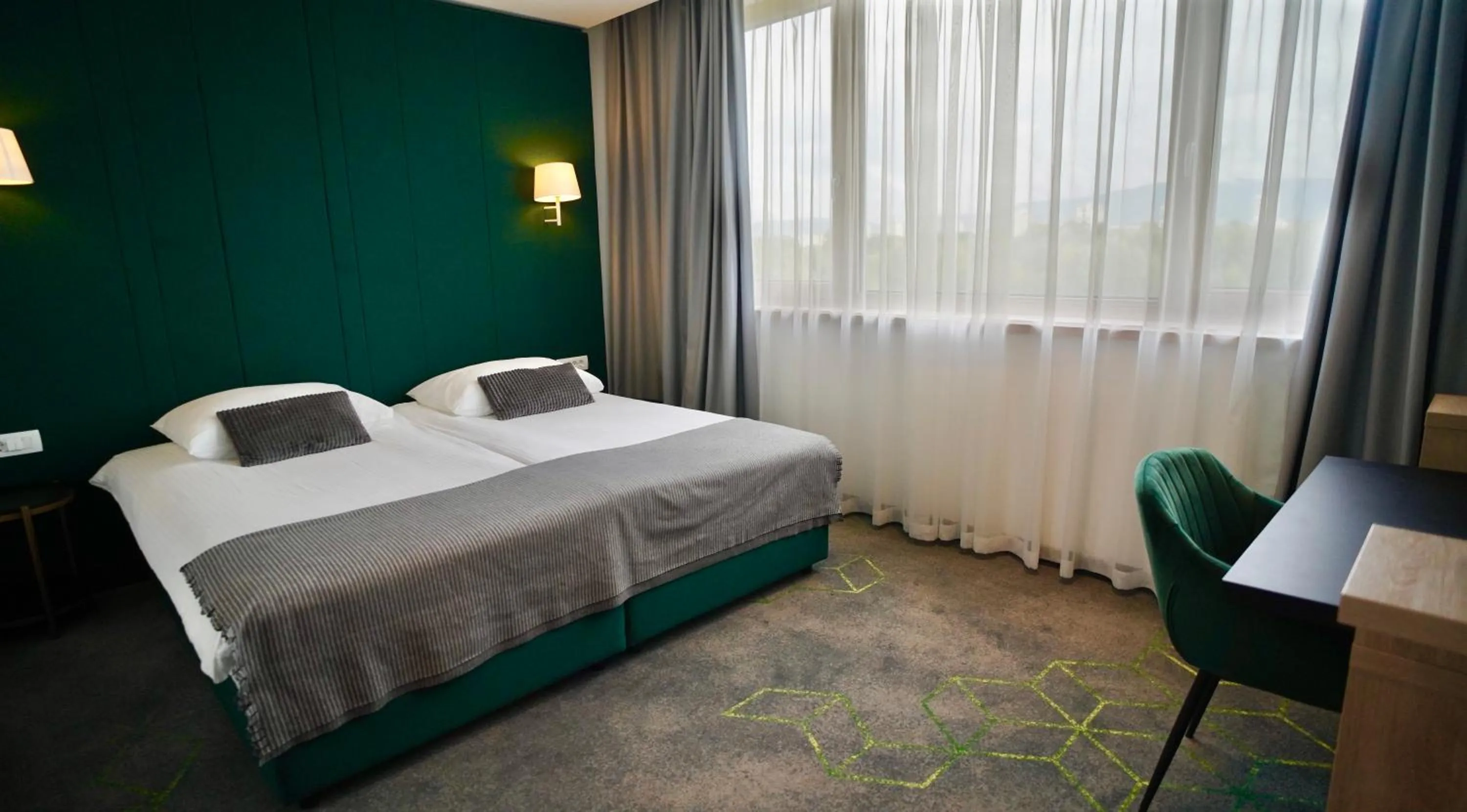 Bed in Hotel Diplomat