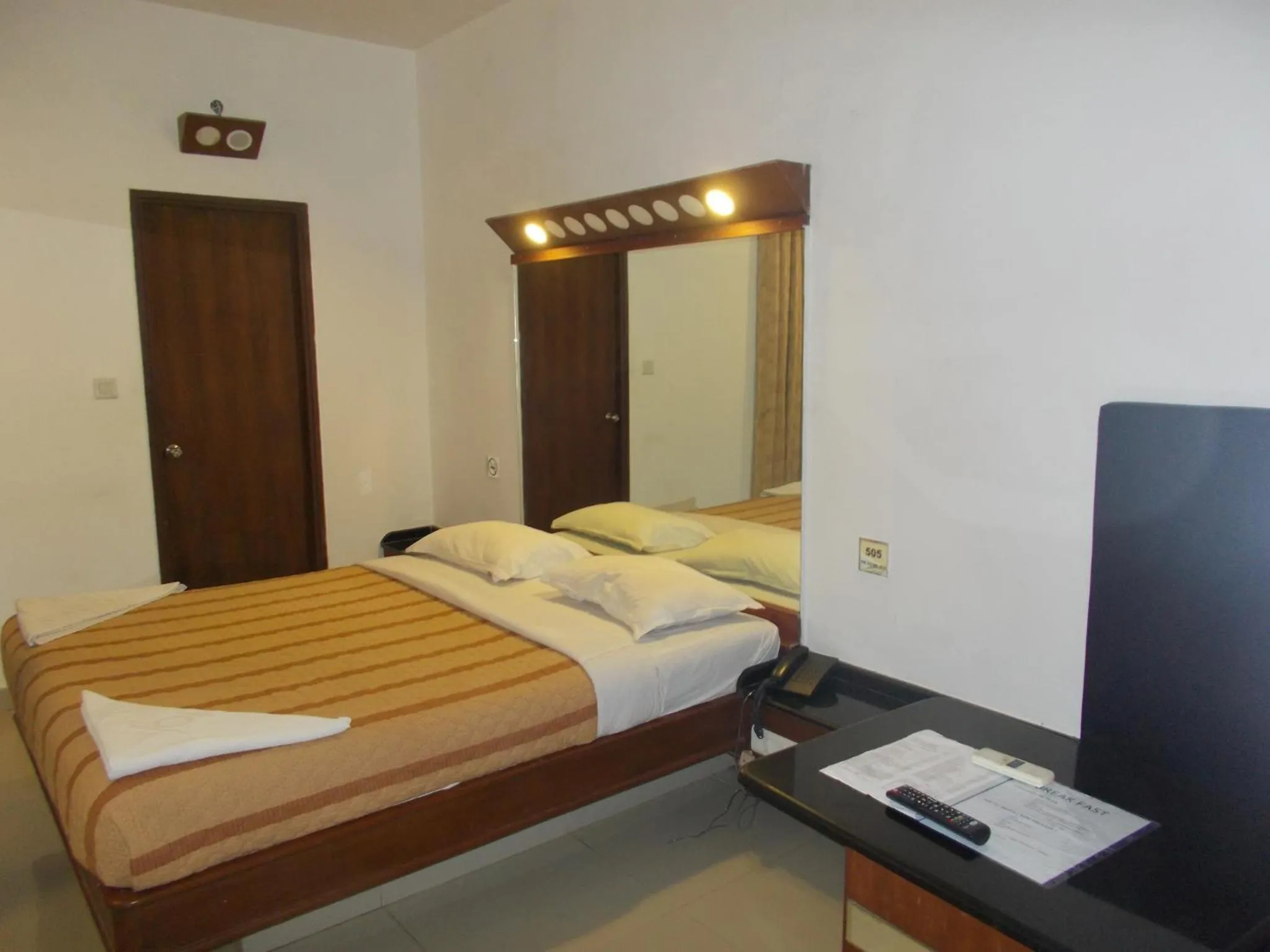 Bedroom, Bed in Lotus Comfort - A Pondy Hotel