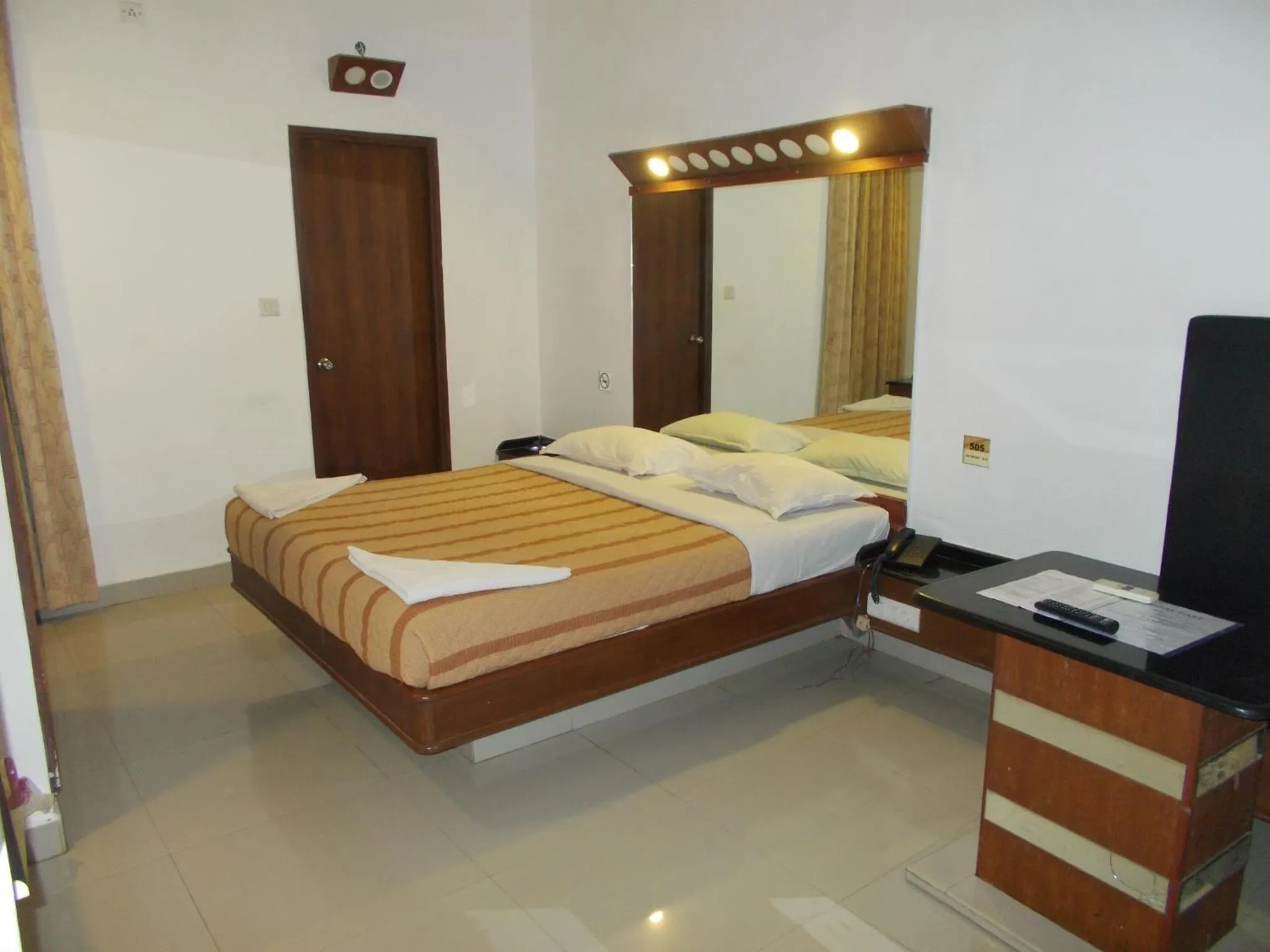 Bedroom, Bed in Lotus Comfort - A Pondy Hotel