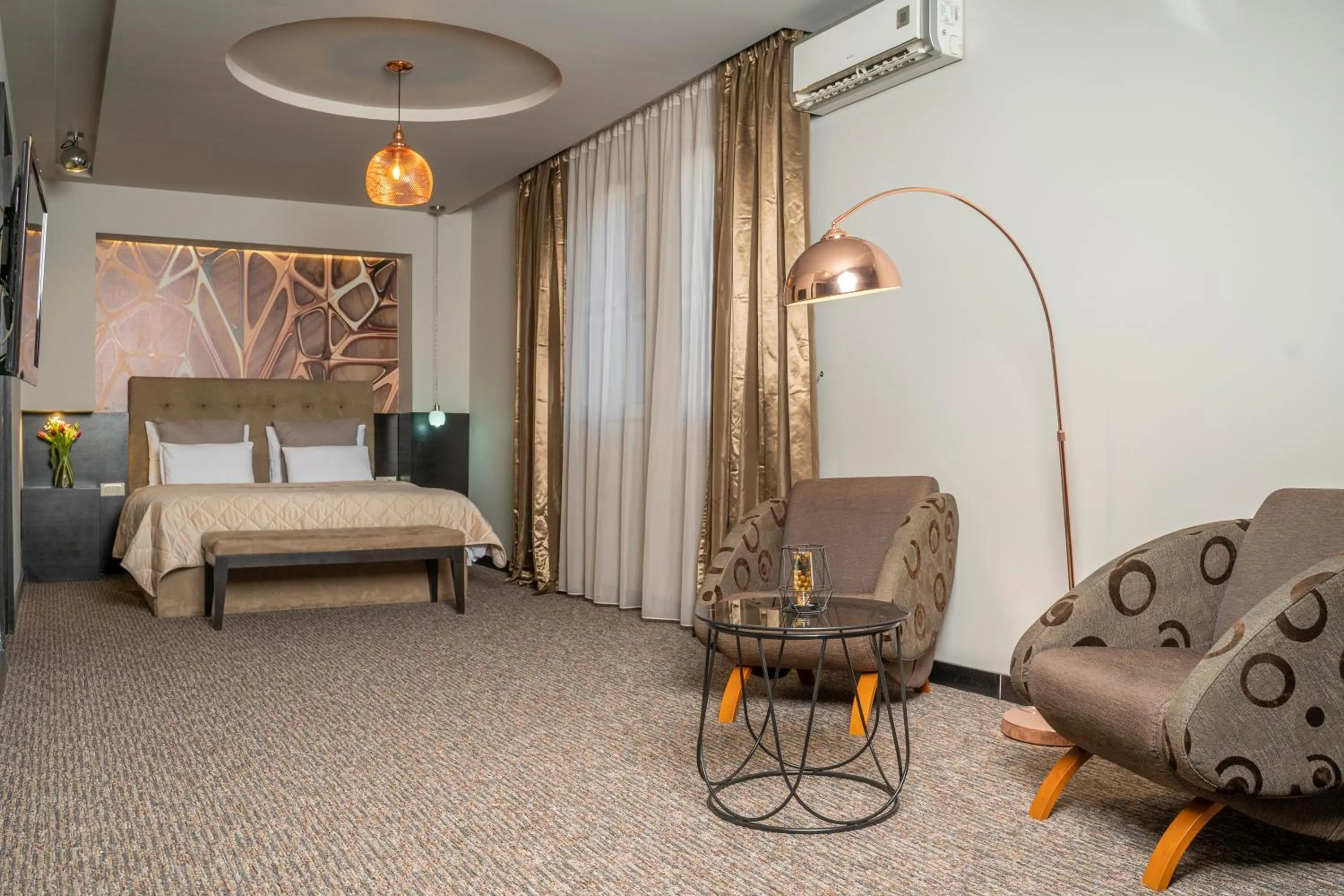 Seating area, Bed in Akacija Luxury Suites