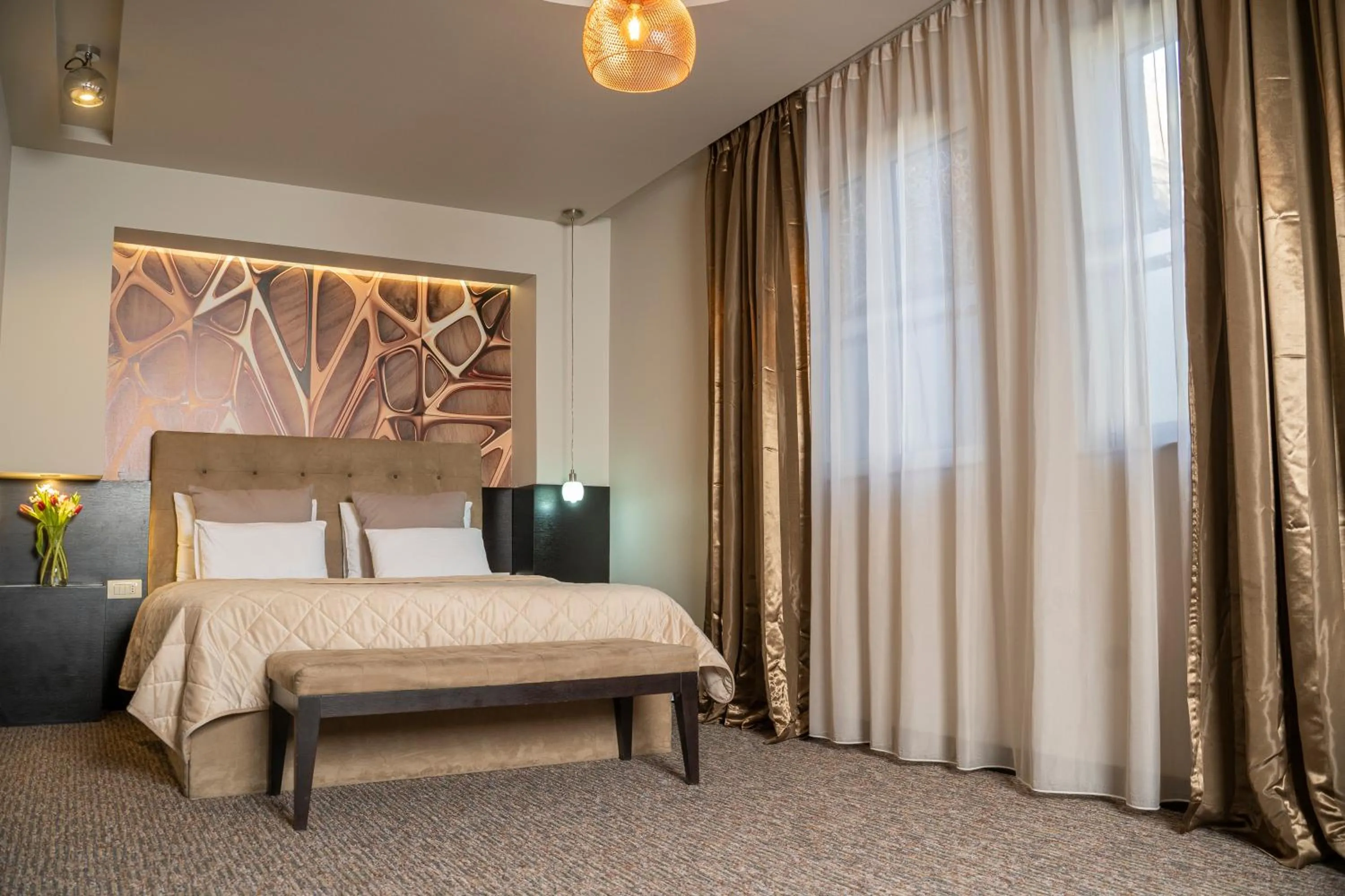 Bed in Akacija Luxury Suites