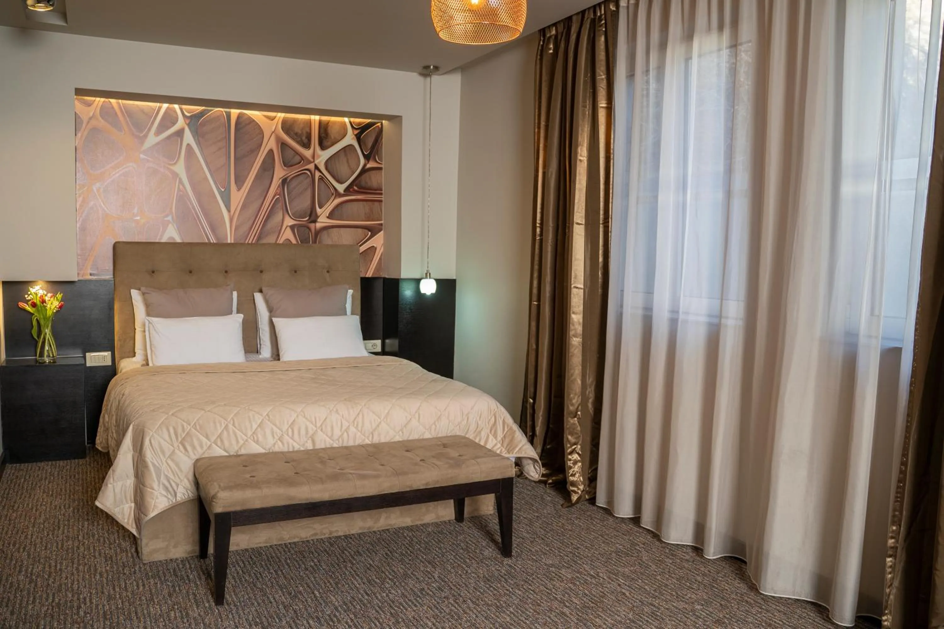 Bed in Akacija Luxury Suites