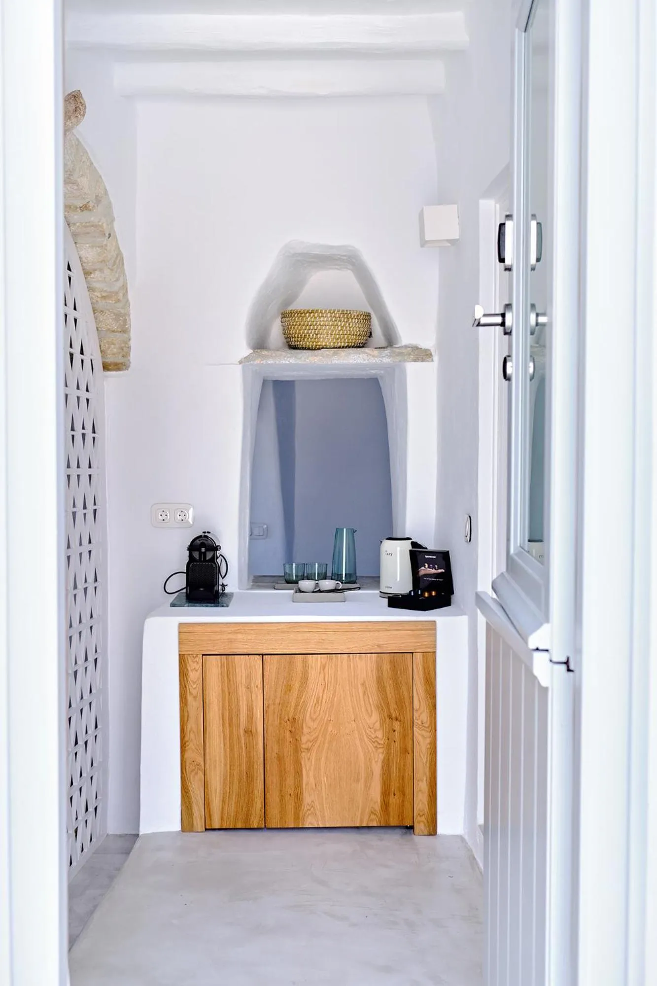 Bedroom in Living Theros Luxury Suites