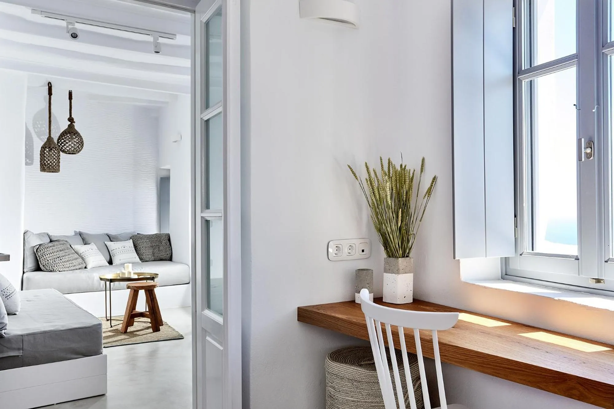 Seating area in Living Theros Luxury Suites