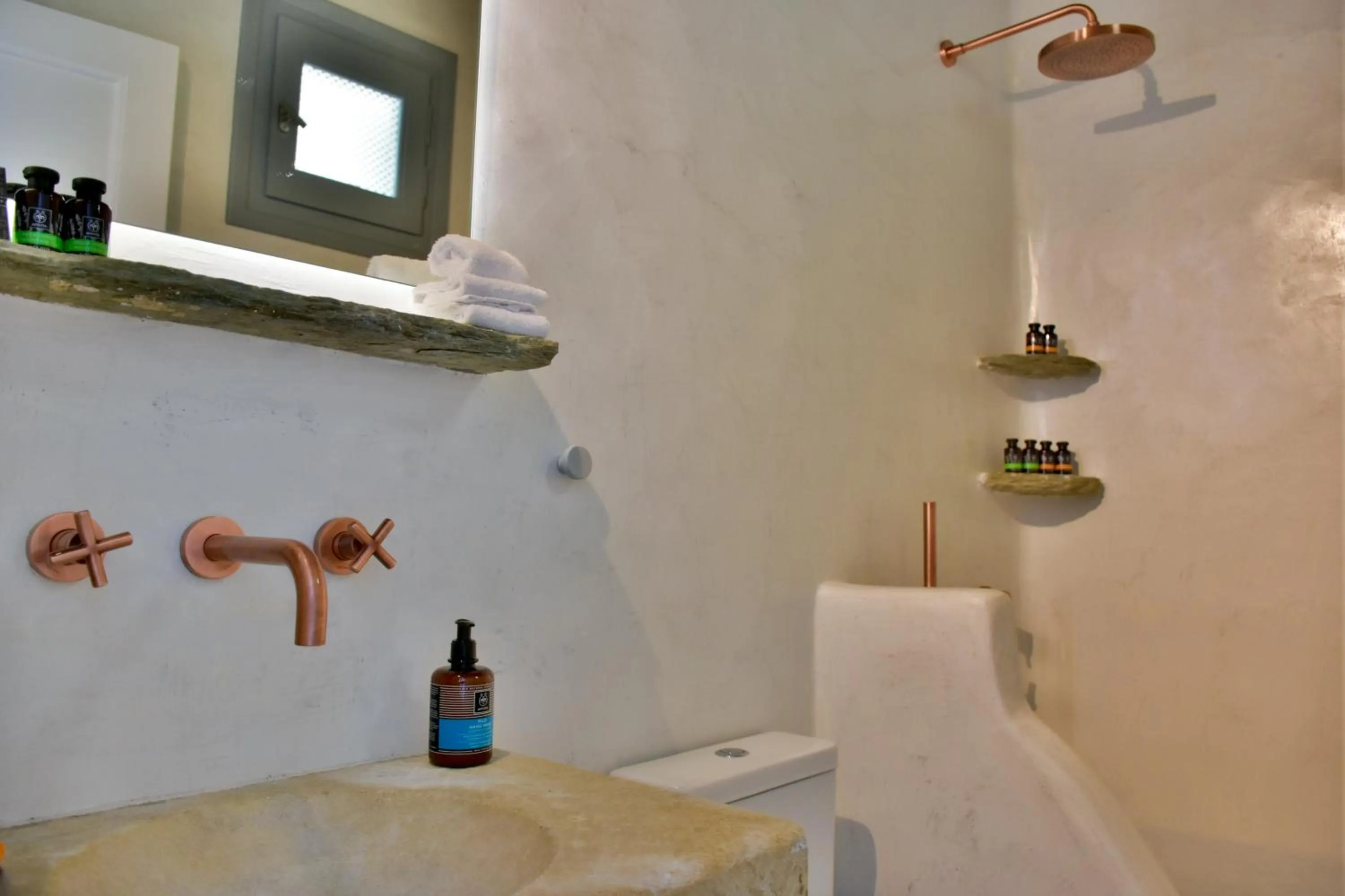 Bathroom in Living Theros Luxury Suites