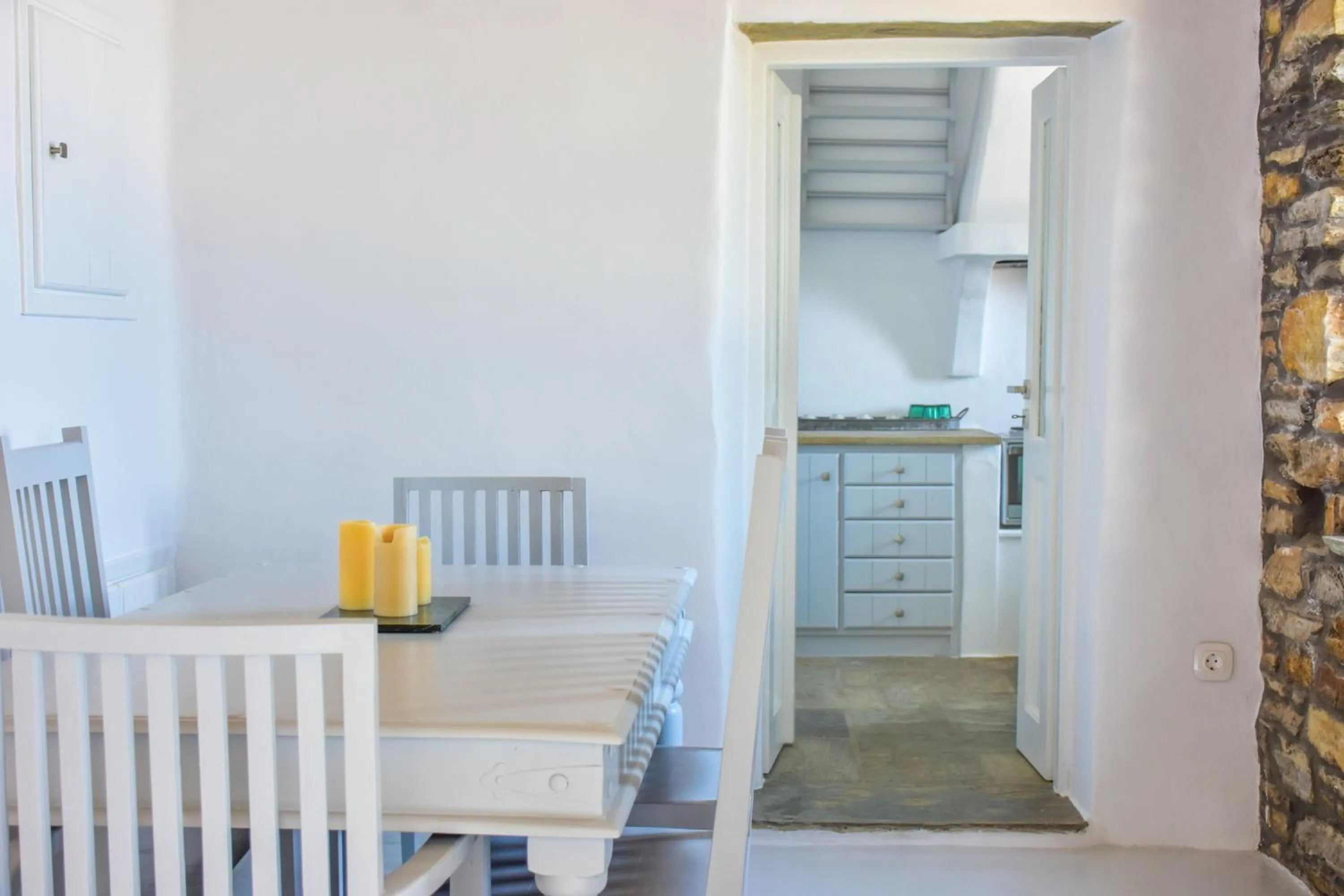 Dining area in Living Theros Luxury Suites