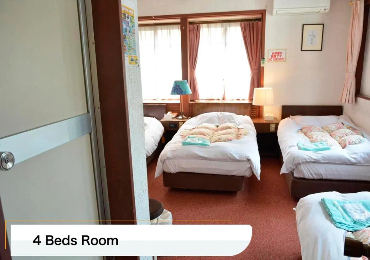 Bed in Hotel Montblanc Hakuba