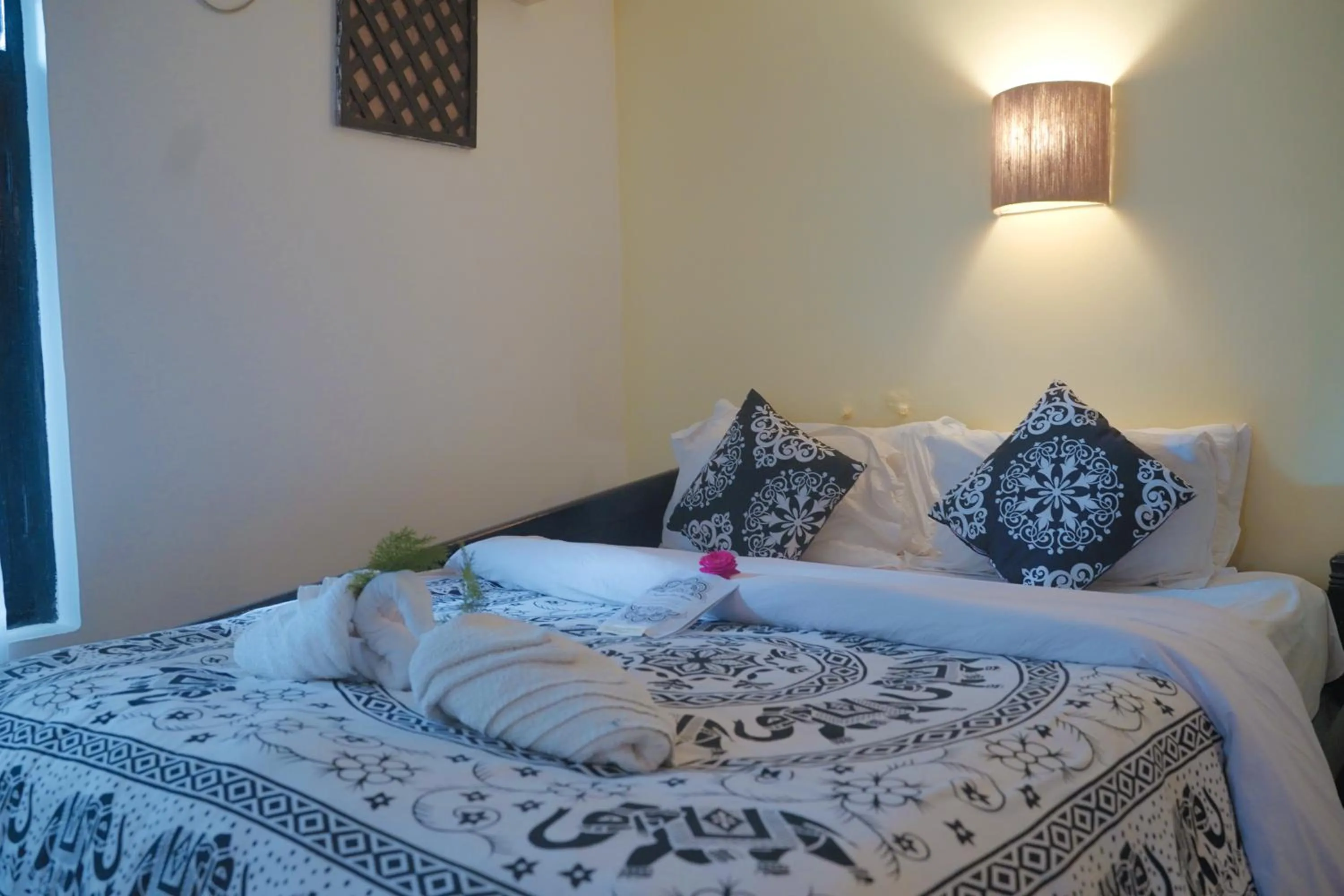 Bed in Sapana Village Lodge