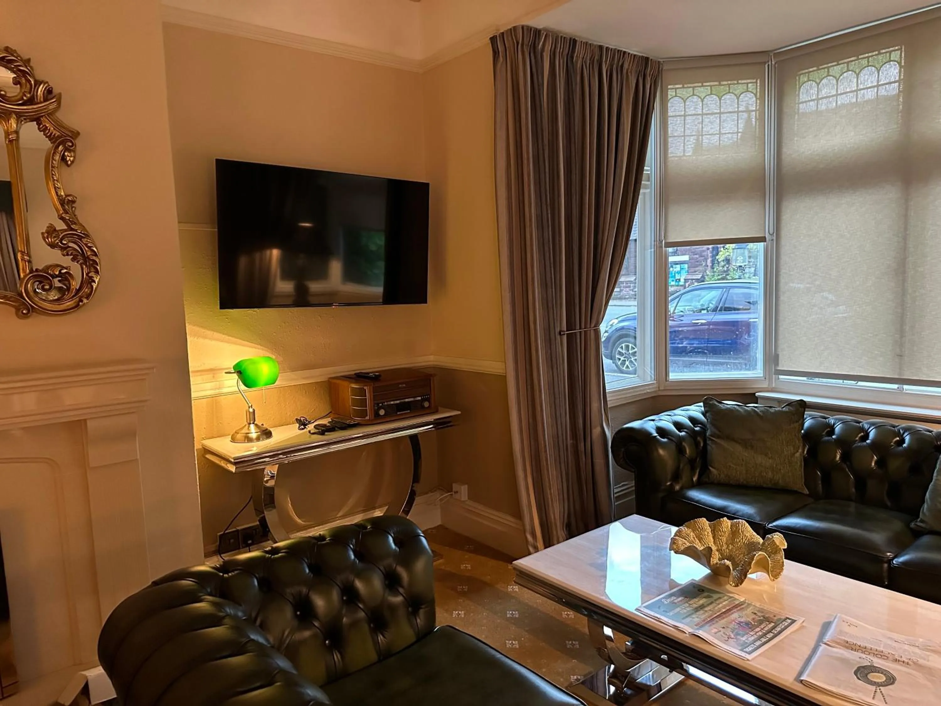 Communal lounge/ TV room in Chester House Guest House