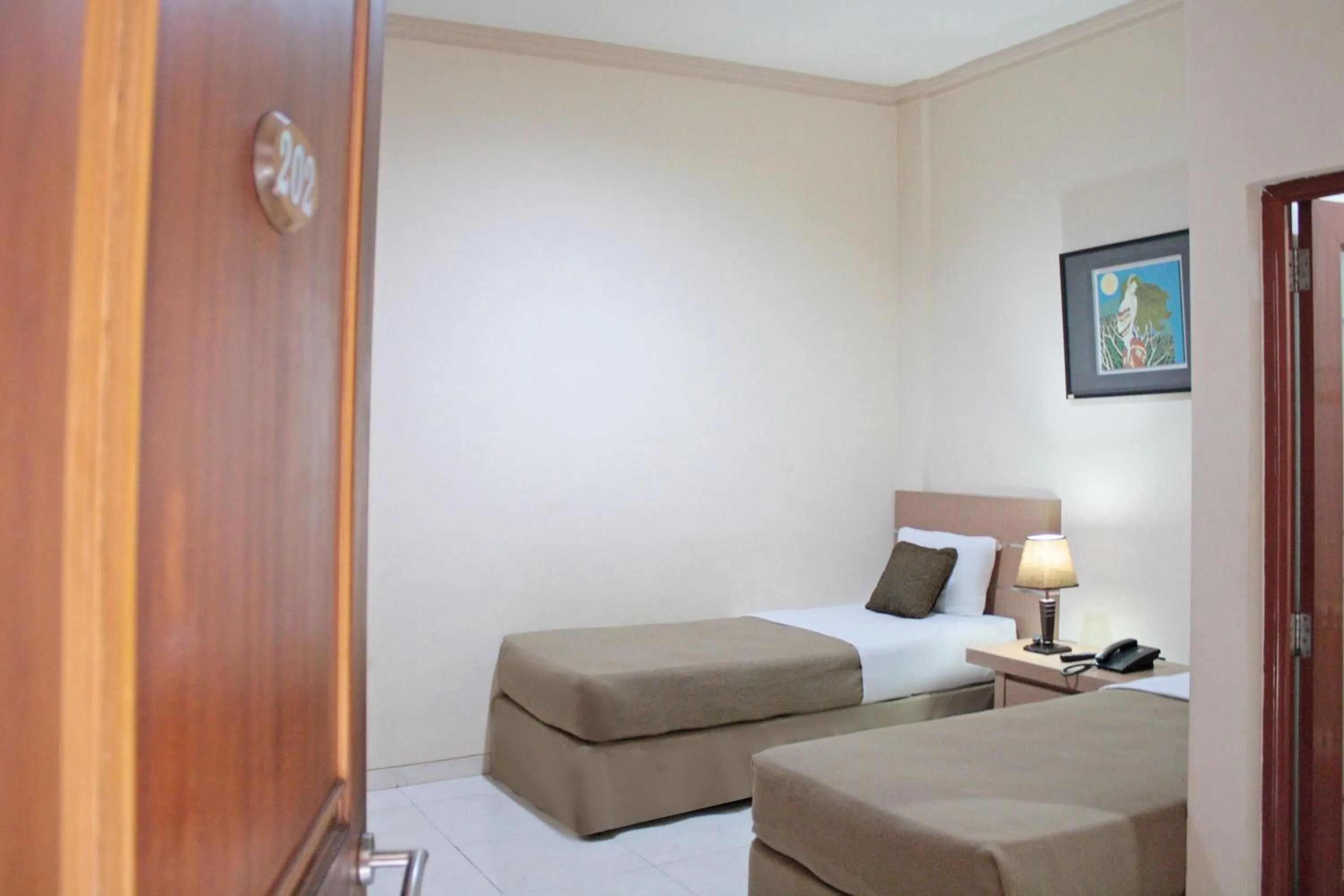 Bed in Hotel Graha DPT 33