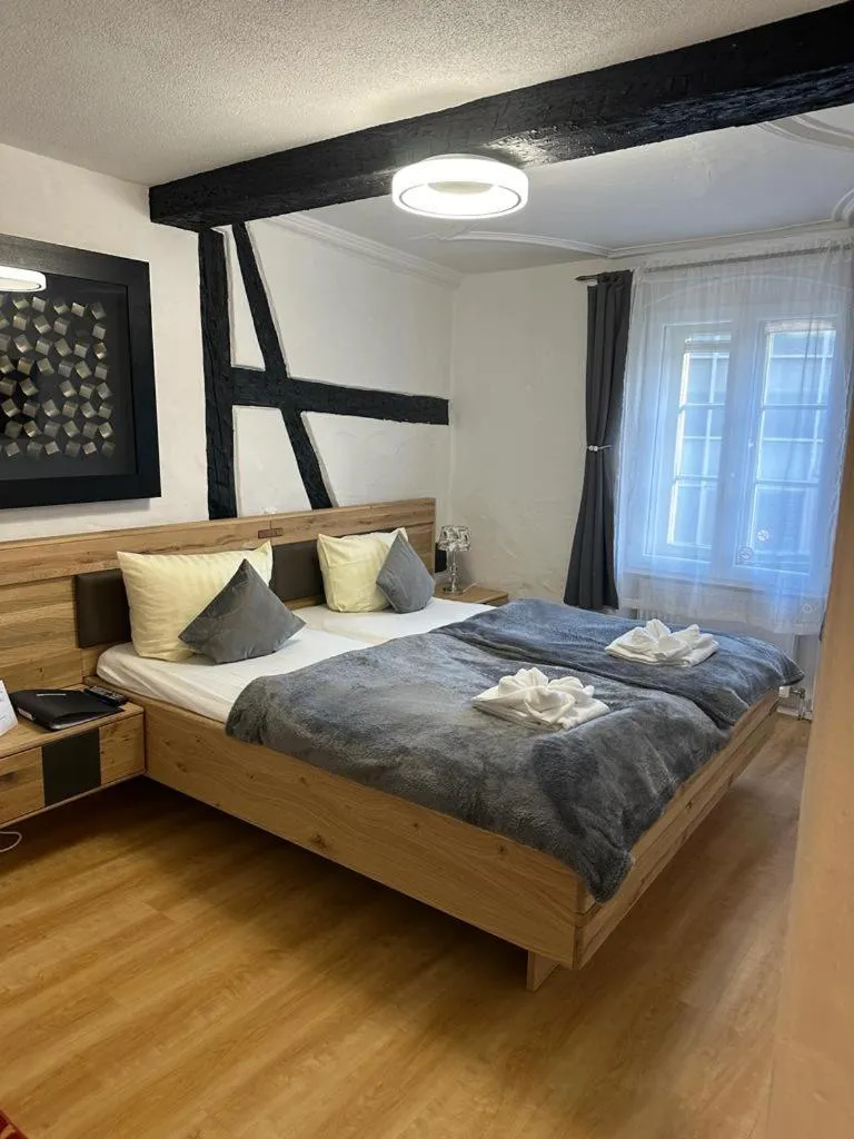 Bed in Hotel Zum Goldenen Anker