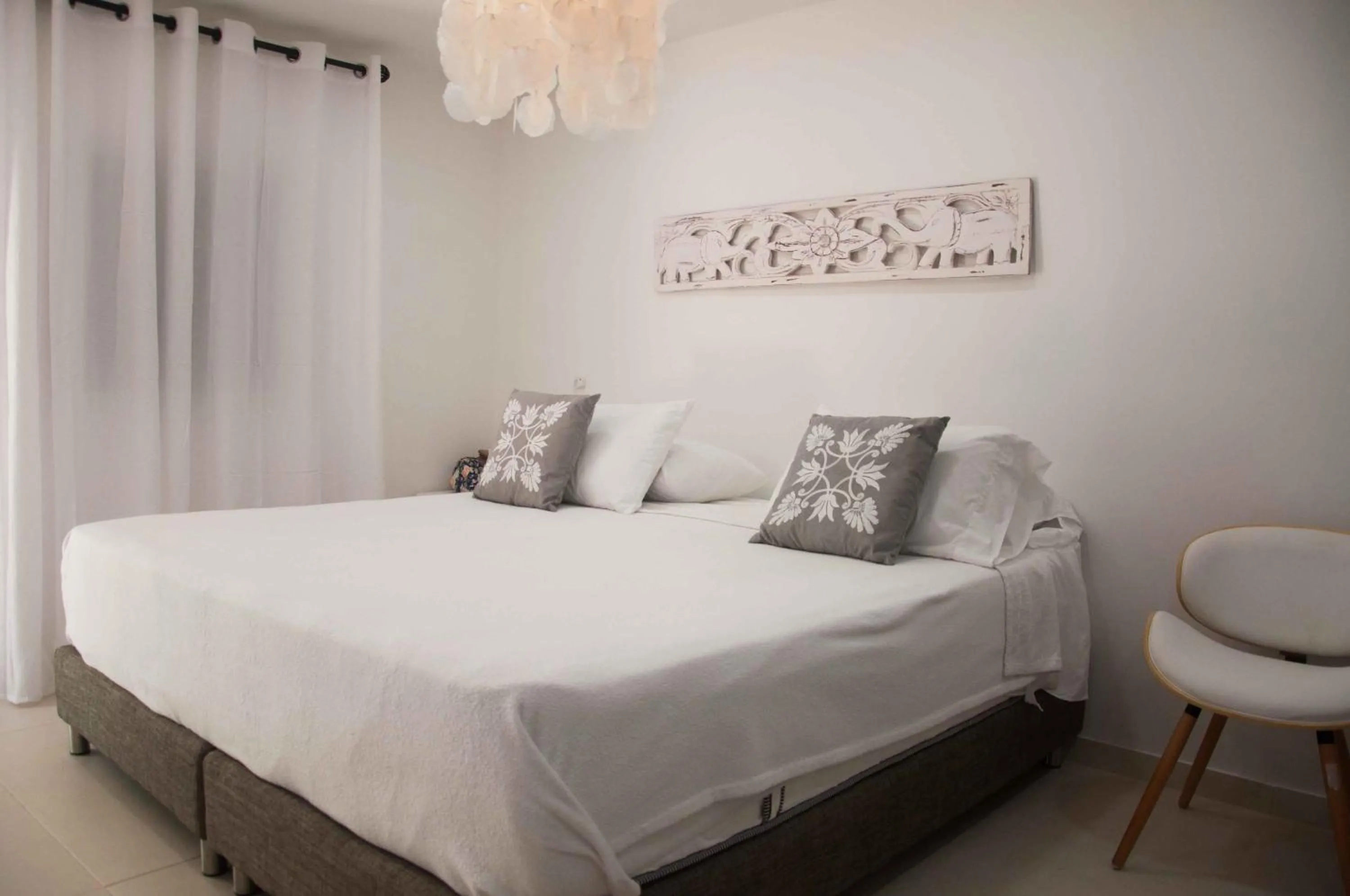 Bed in Le Castel Blanc Hotel Boutique