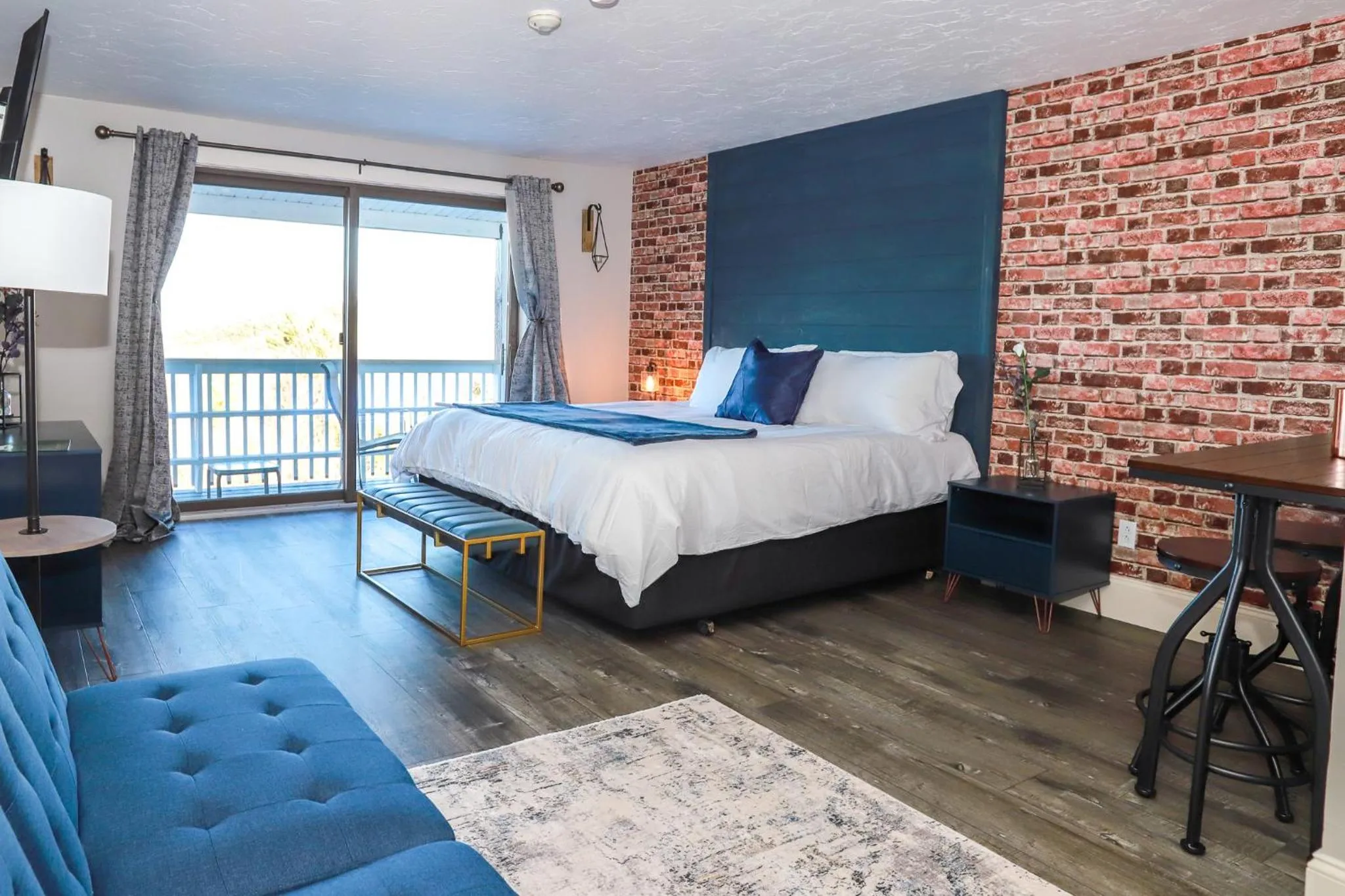 Bed in Gunstock Inn & Suites