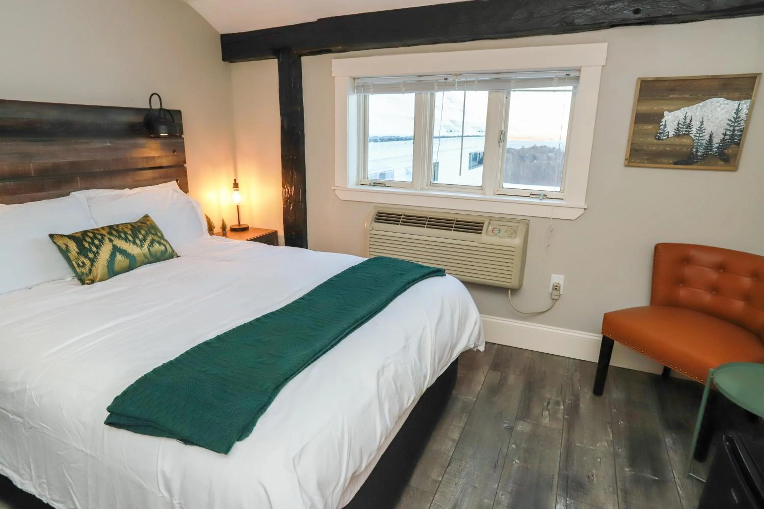 Bed in Gunstock Inn & Suites