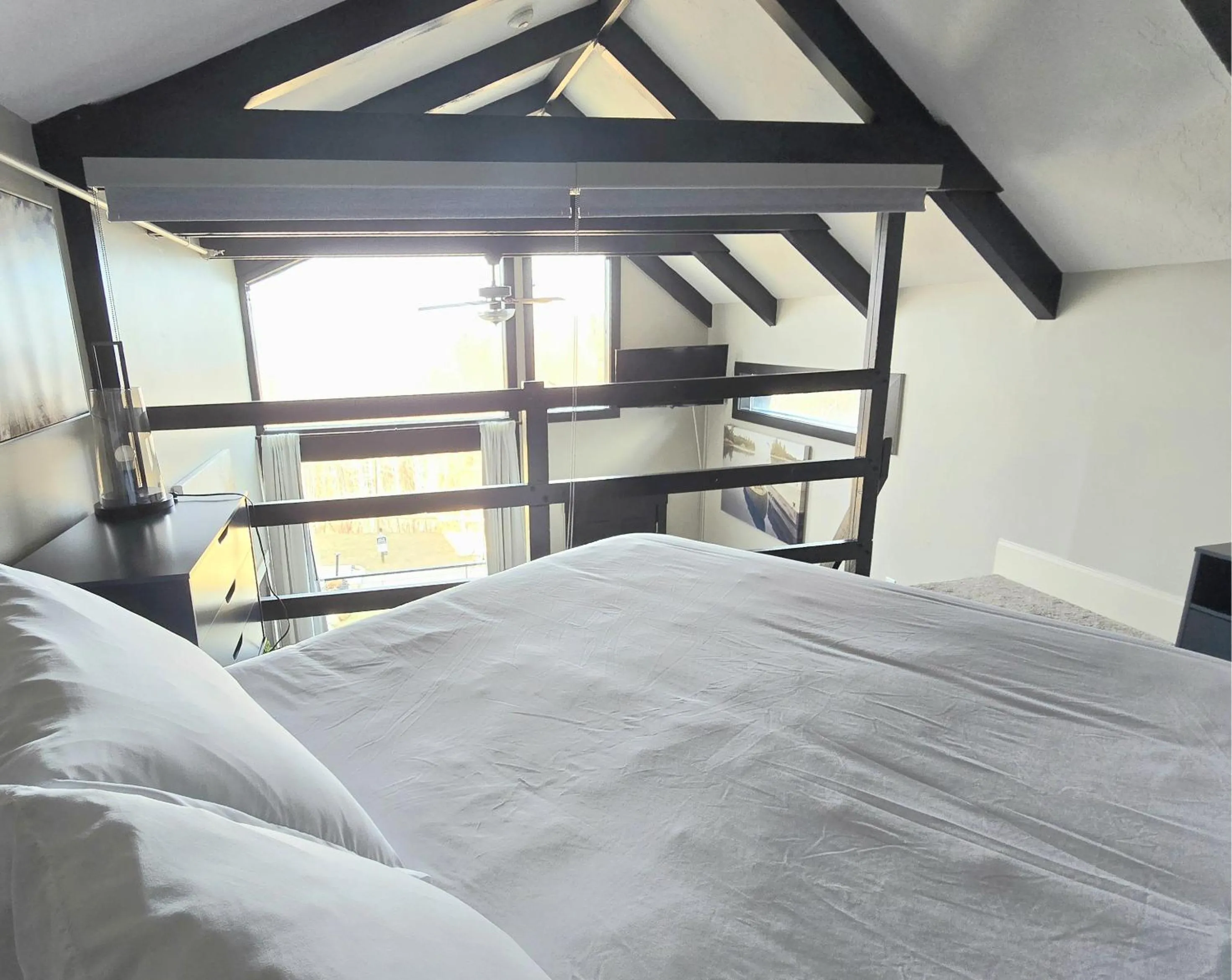 Bed in Gunstock Inn & Suites