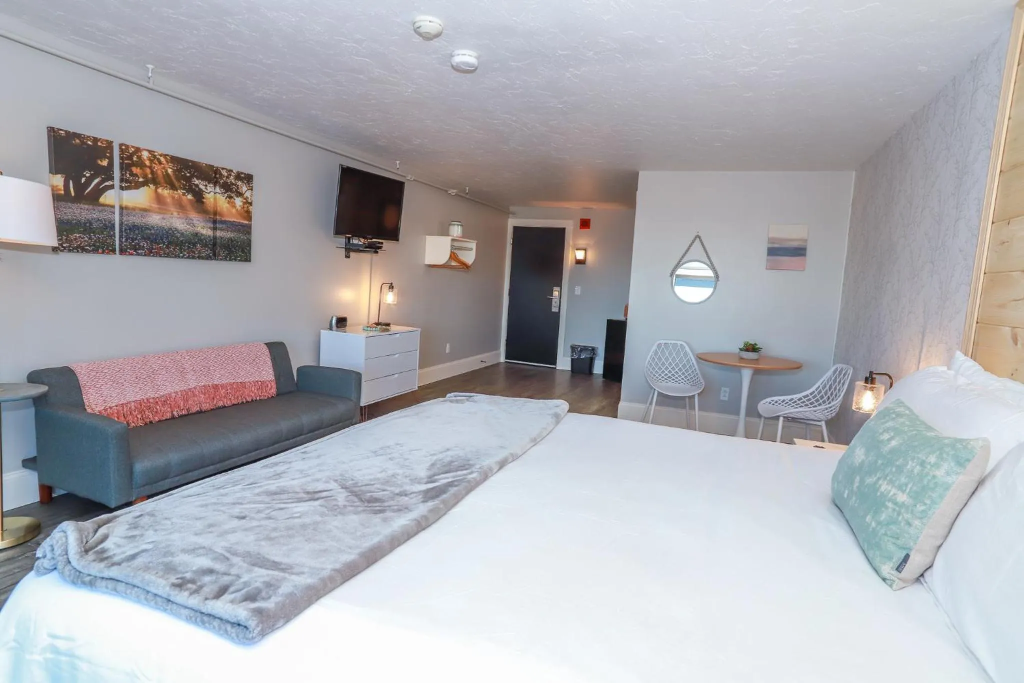 Bed in Gunstock Inn & Suites