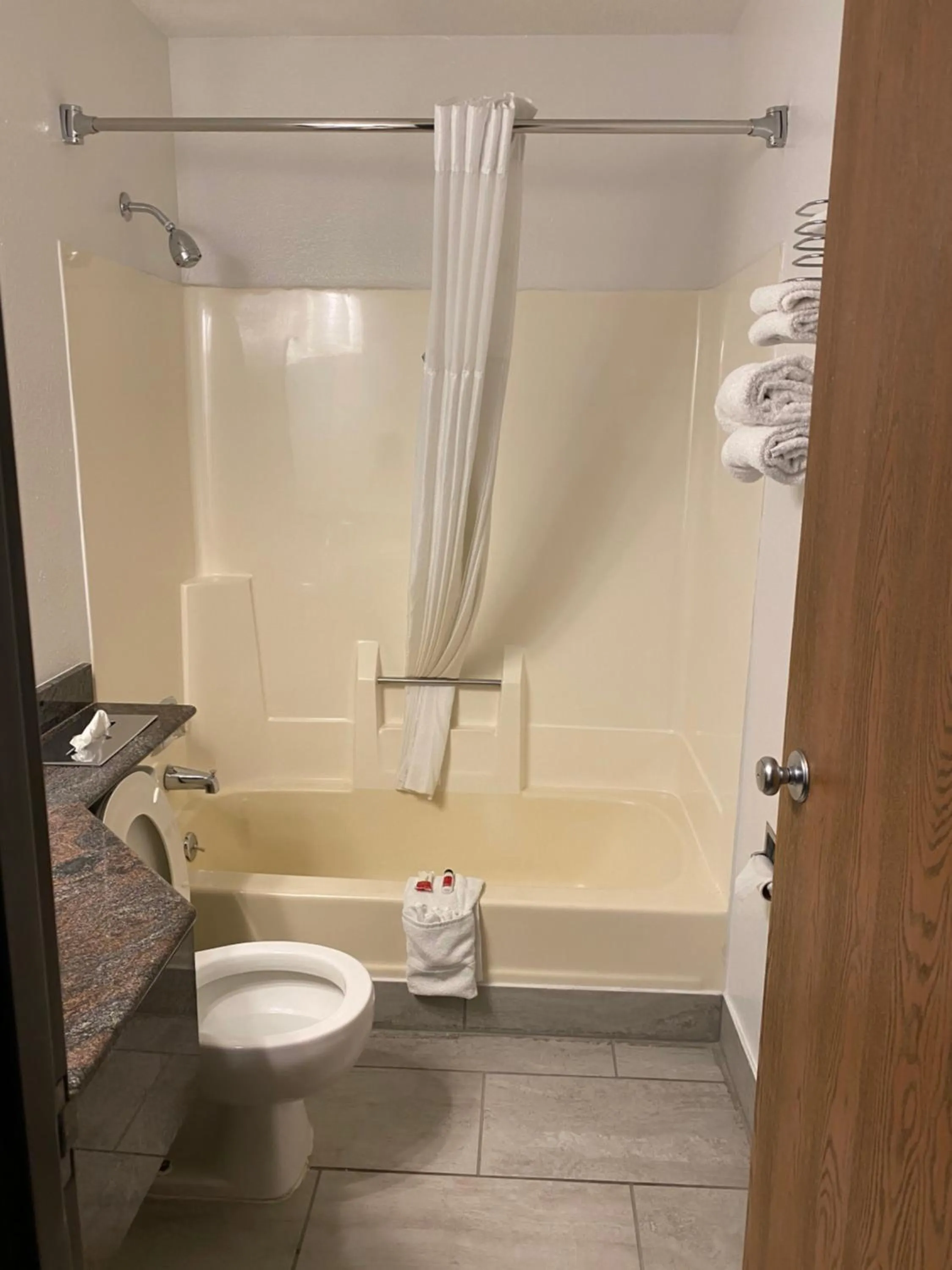 Bathroom in Travelodge by Wyndham La Porte/Michigan City Area