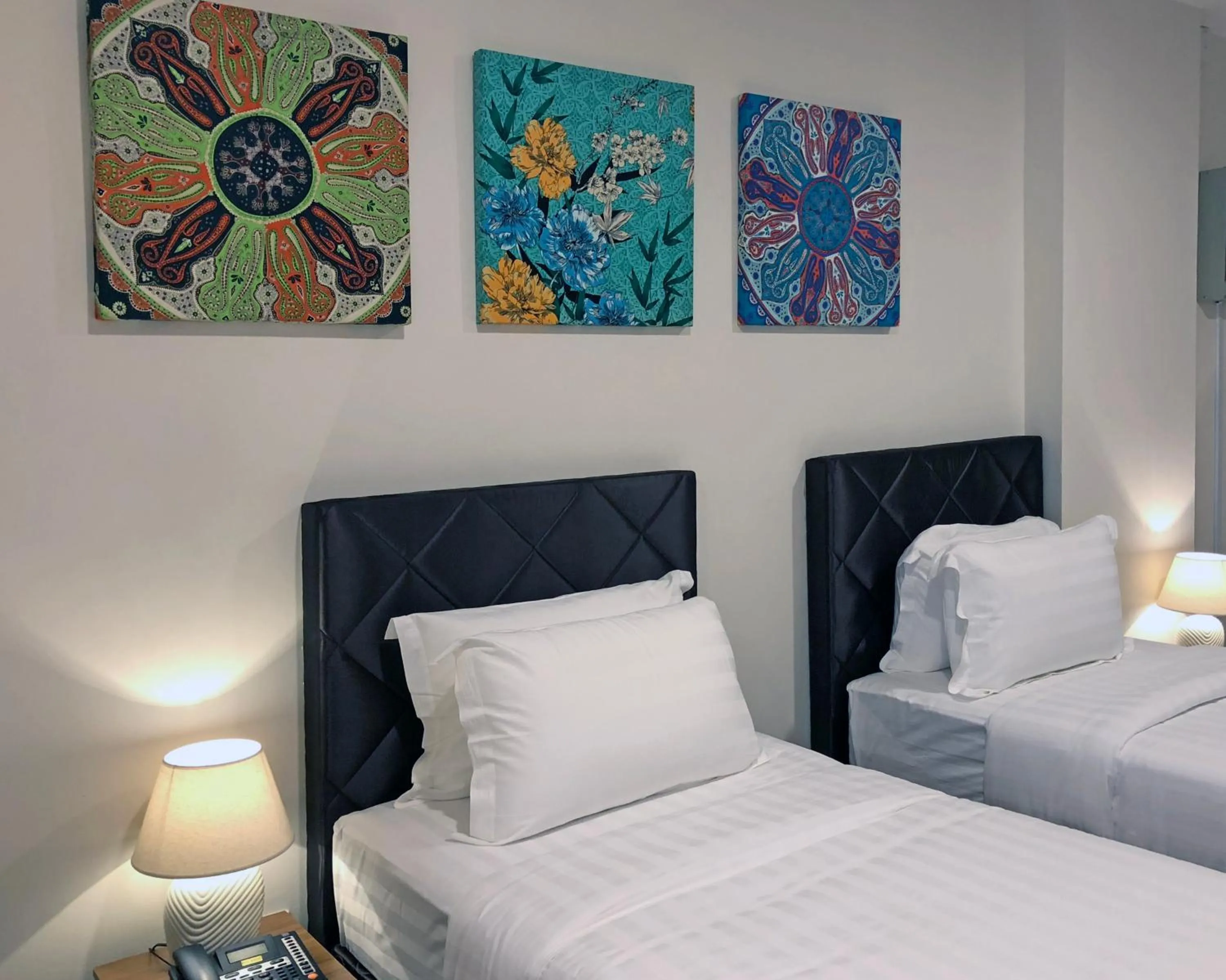 Bed in Aman Hills Hotel