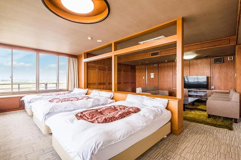 Bed in Ooedo Onsen Monogatari Nagayama