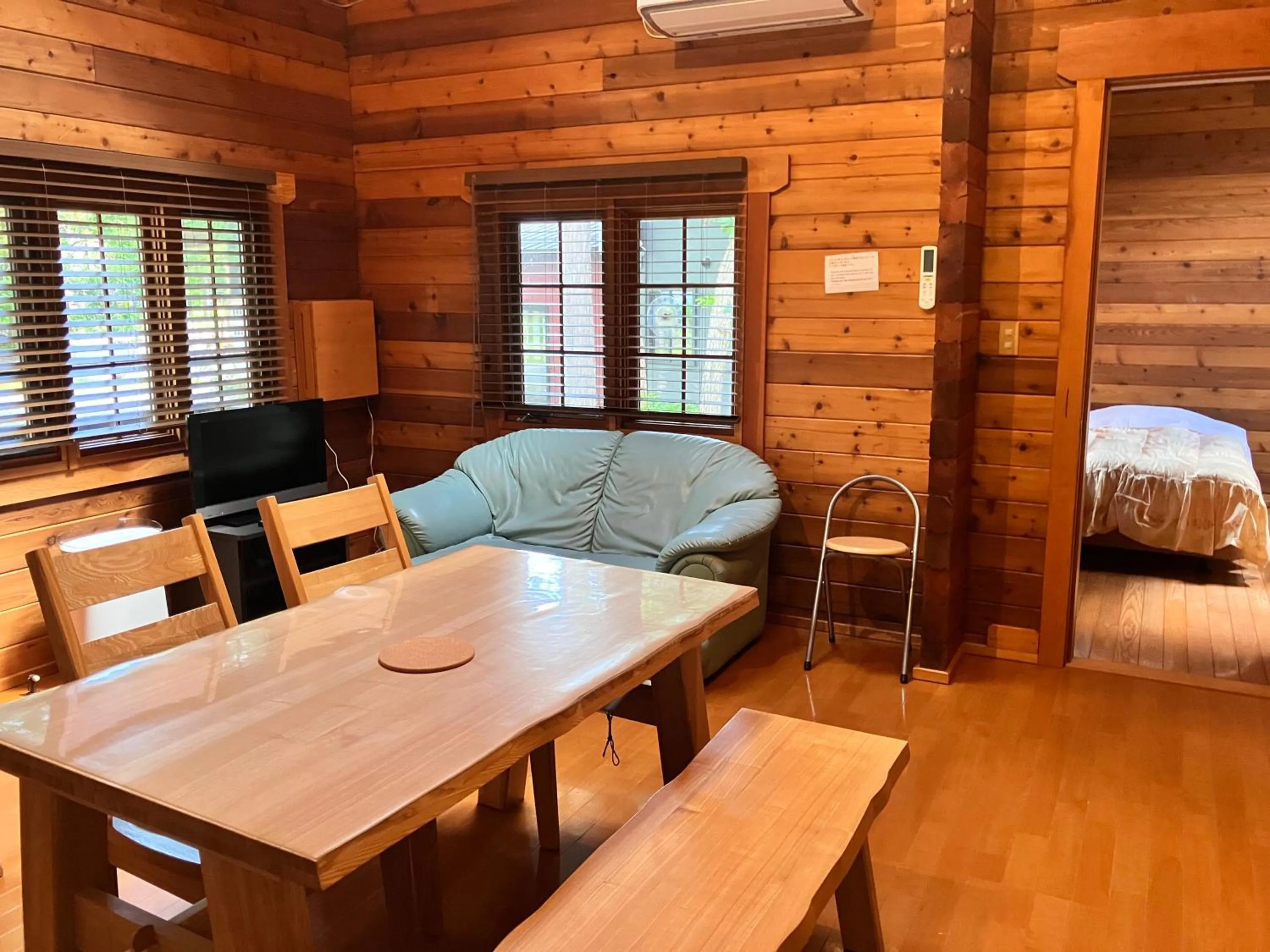 Seating area, Bed in Hakuba Brownie Cottages