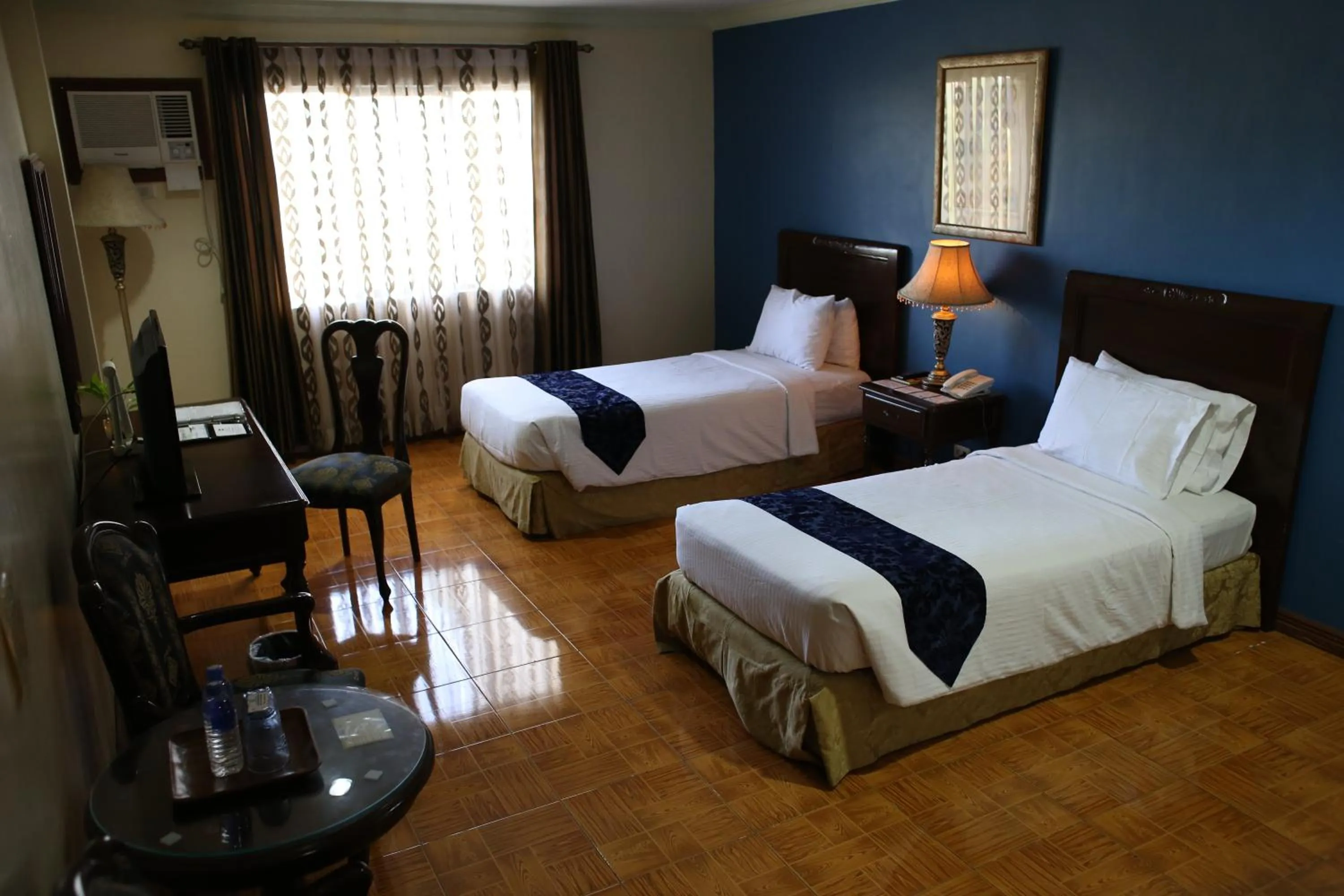 Bed in Crown Royale Hotel