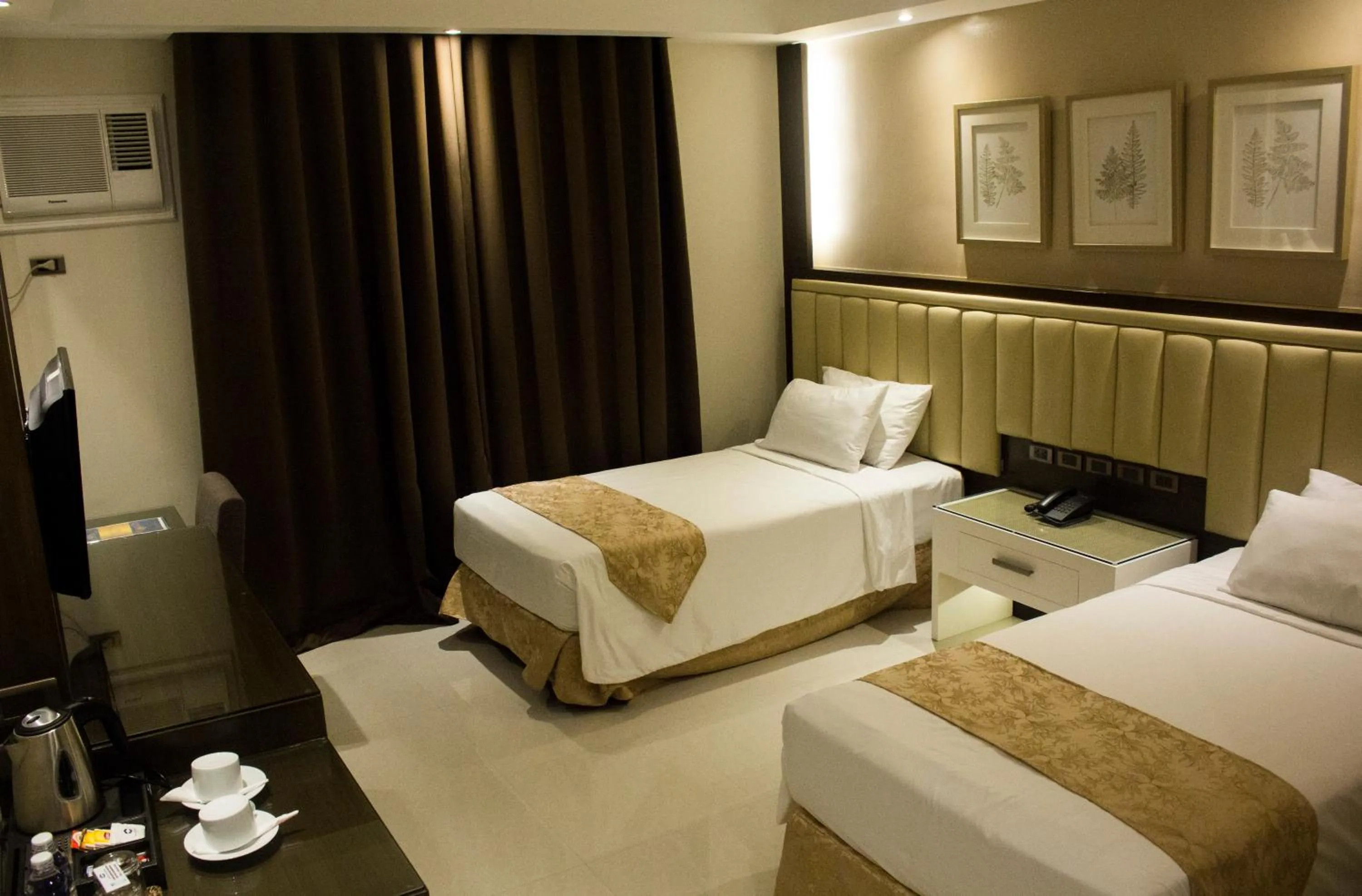 Bed in Crown Royale Hotel