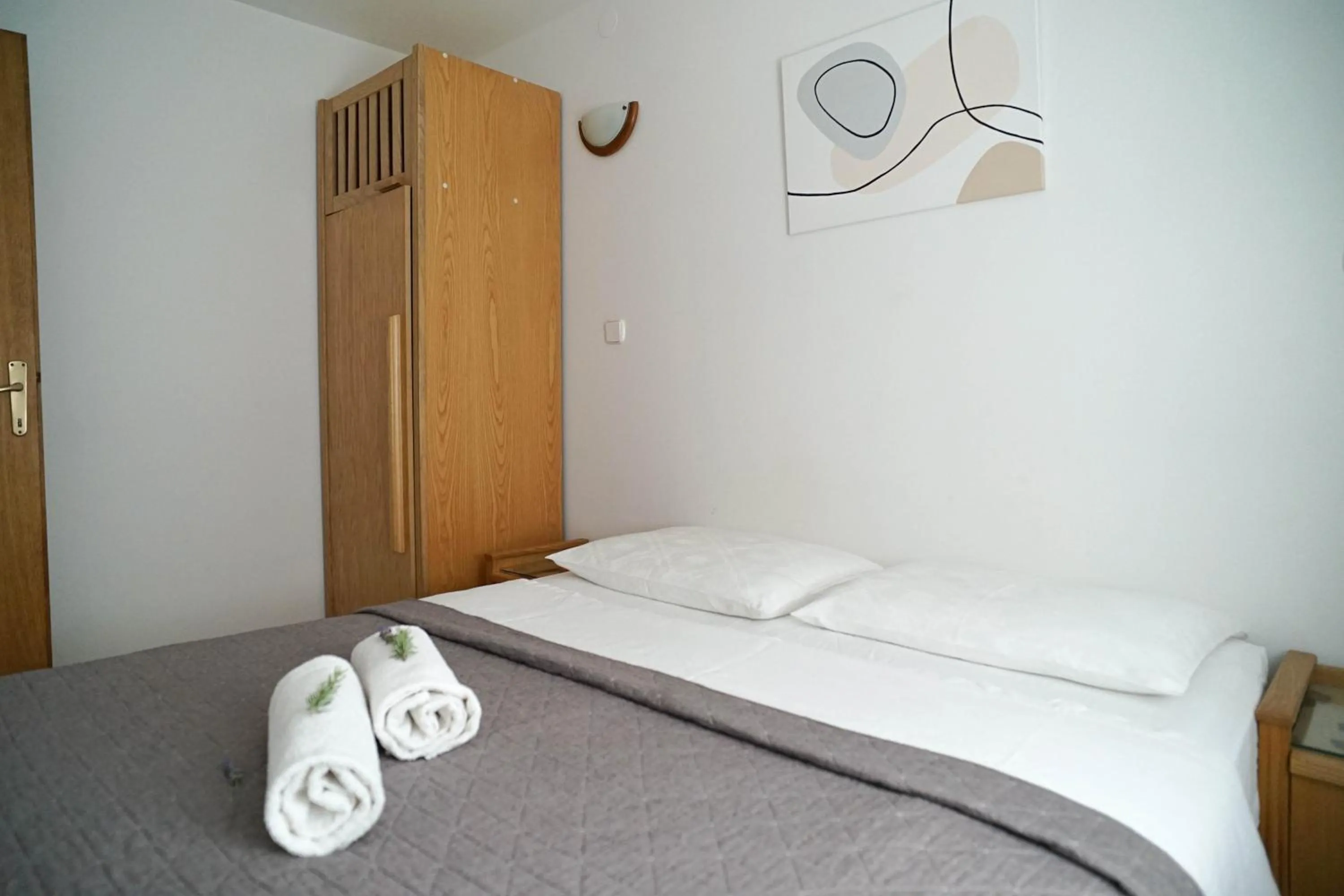 Bedroom, Bed in Apartments and Rooms Degra