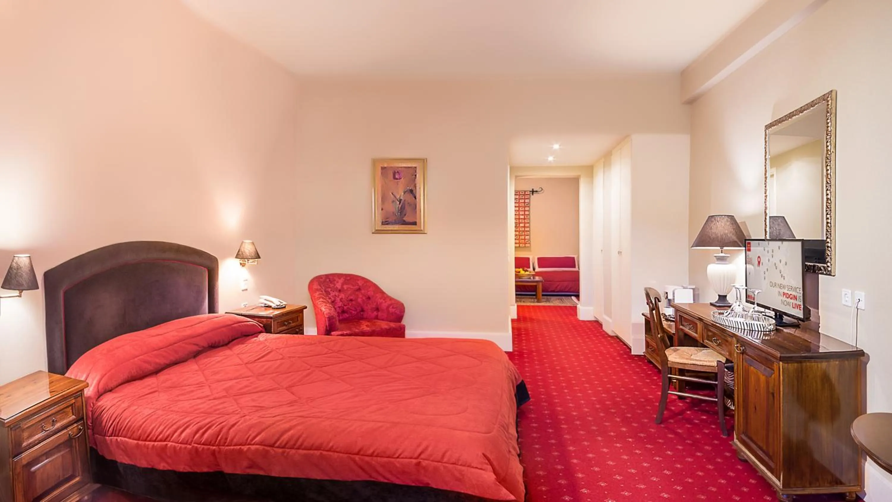 Bed in Country Club Hotel & Suites