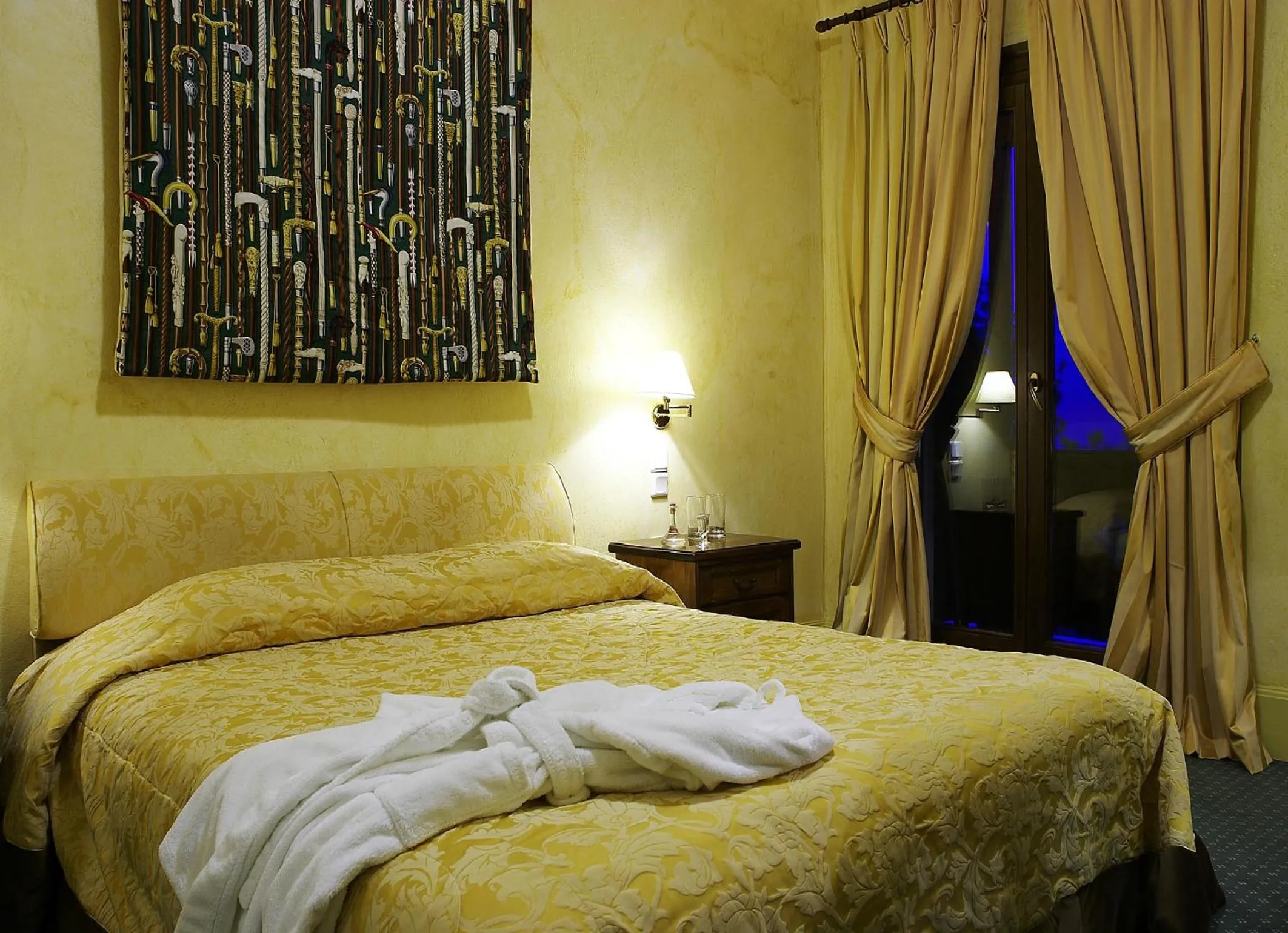 Decorative detail, Bed in Country Club Hotel & Suites