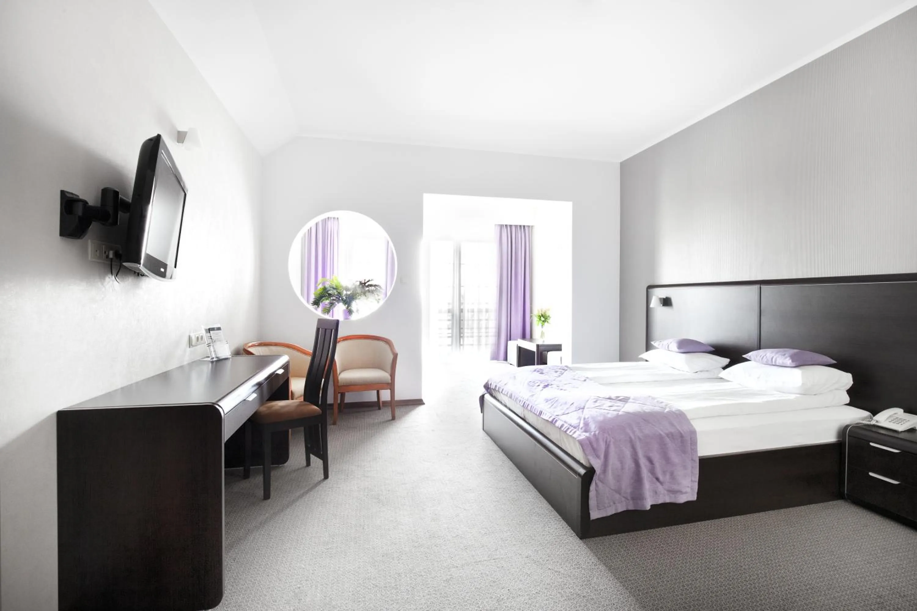 Bed in Artis Hotel & Spa