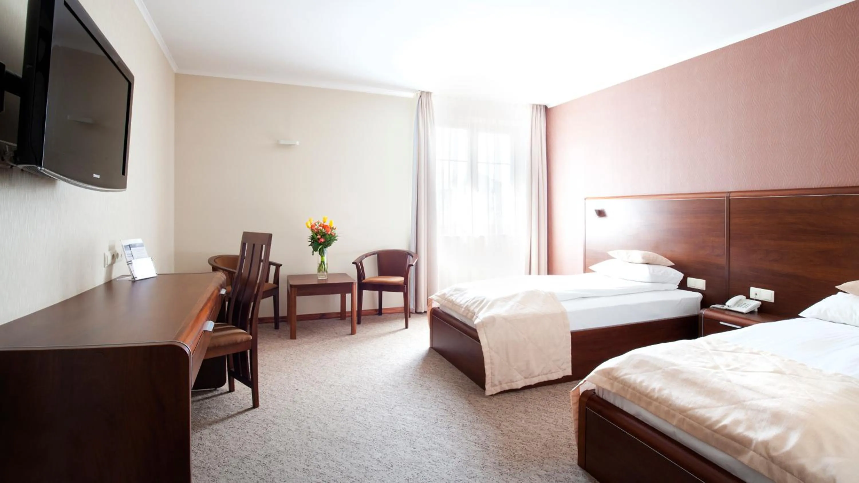 Bed in Artis Hotel & Spa