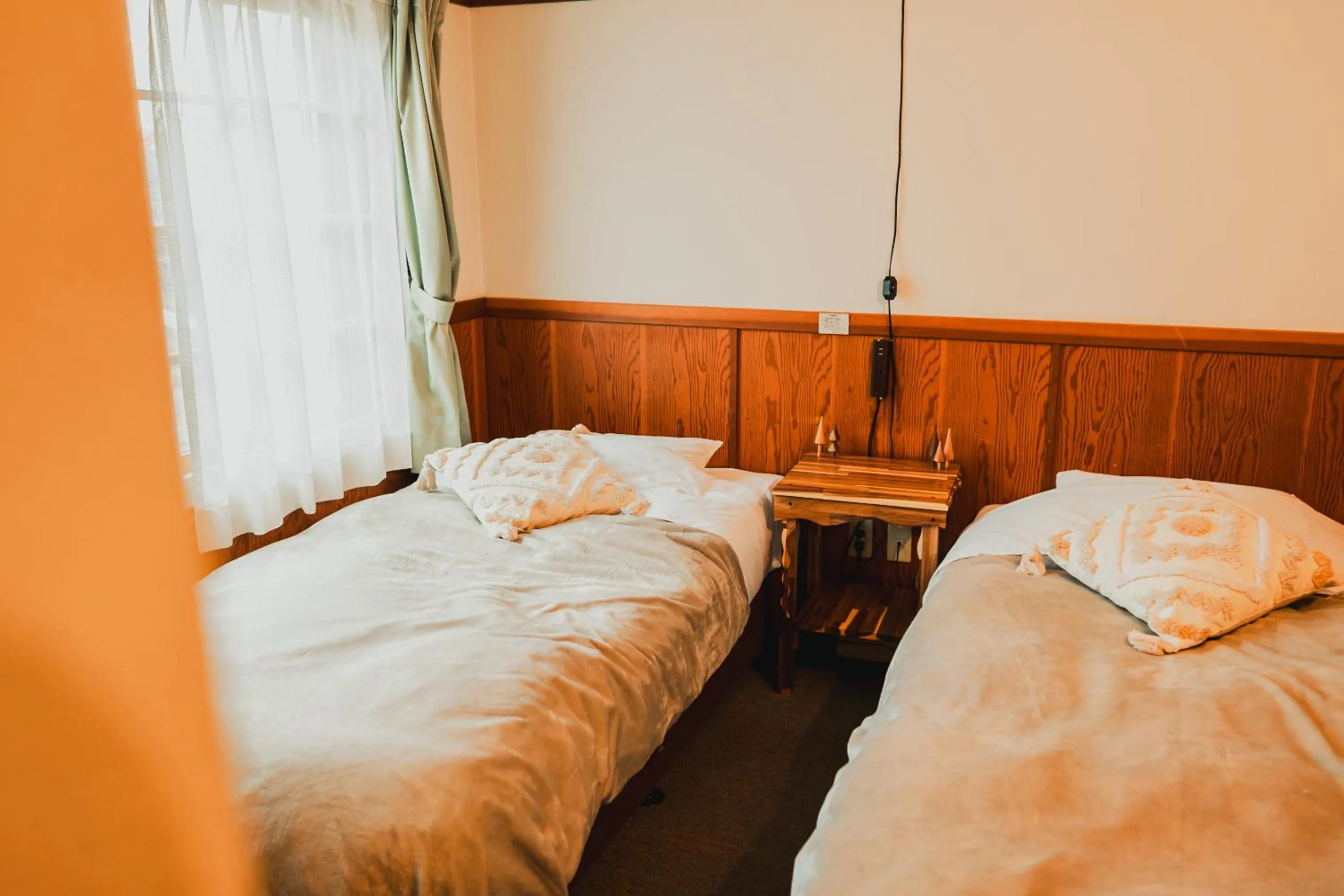 Photo of the whole room, Bed in Hakuba Pension & Log Hotel Meteor