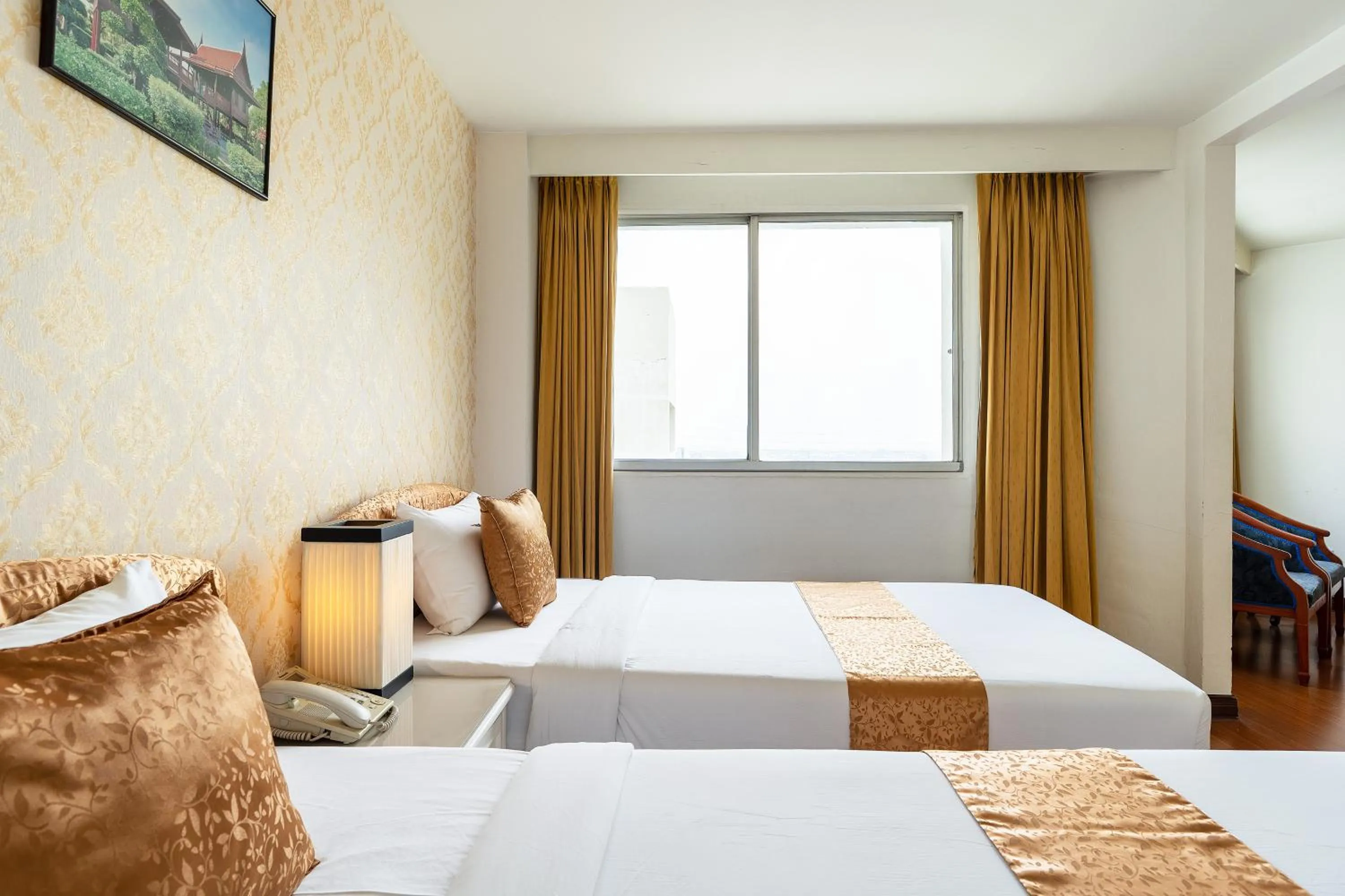 Bed in Summit Pavilion Hotel