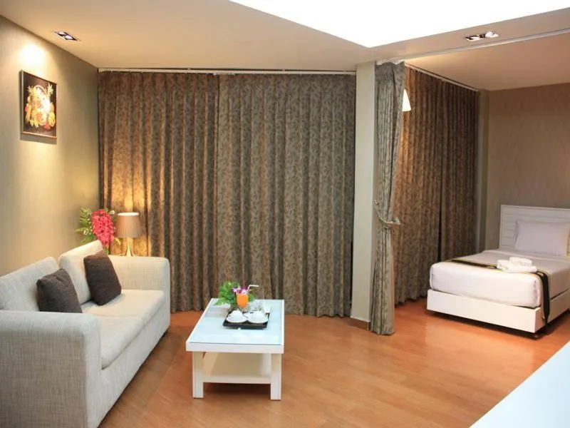 Bed in Summit Pavilion Hotel