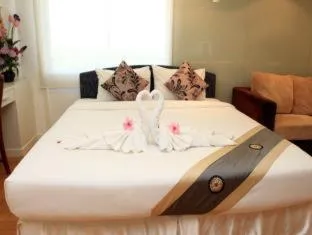 Bed in Summit Pavilion Hotel
