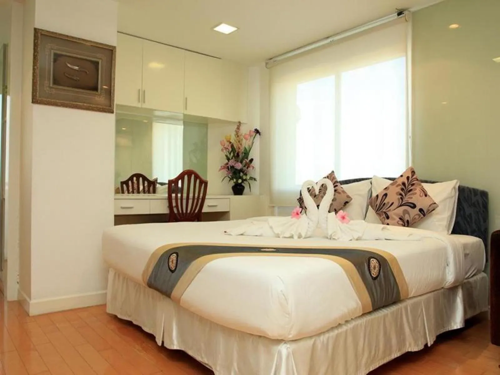 Bed in Summit Pavilion Hotel