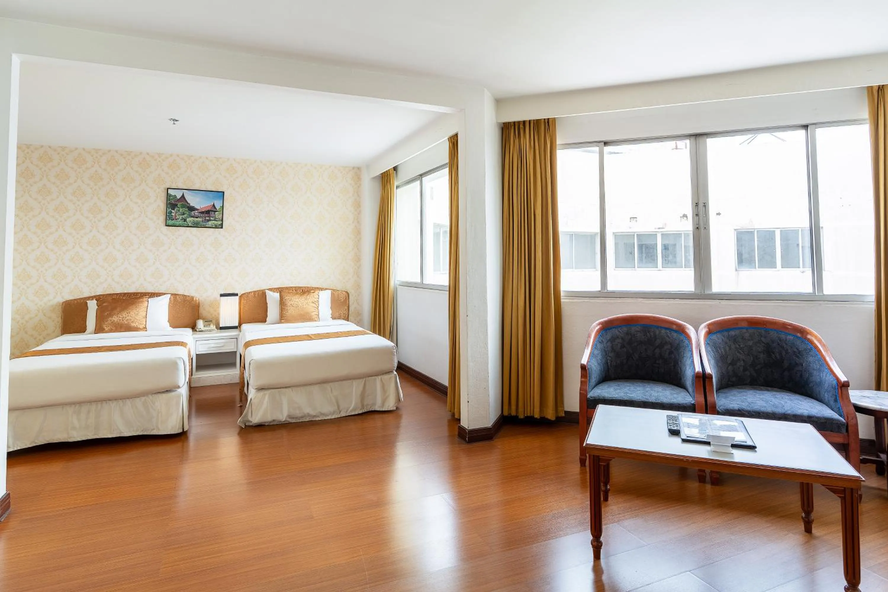 Bed in Summit Pavilion Hotel