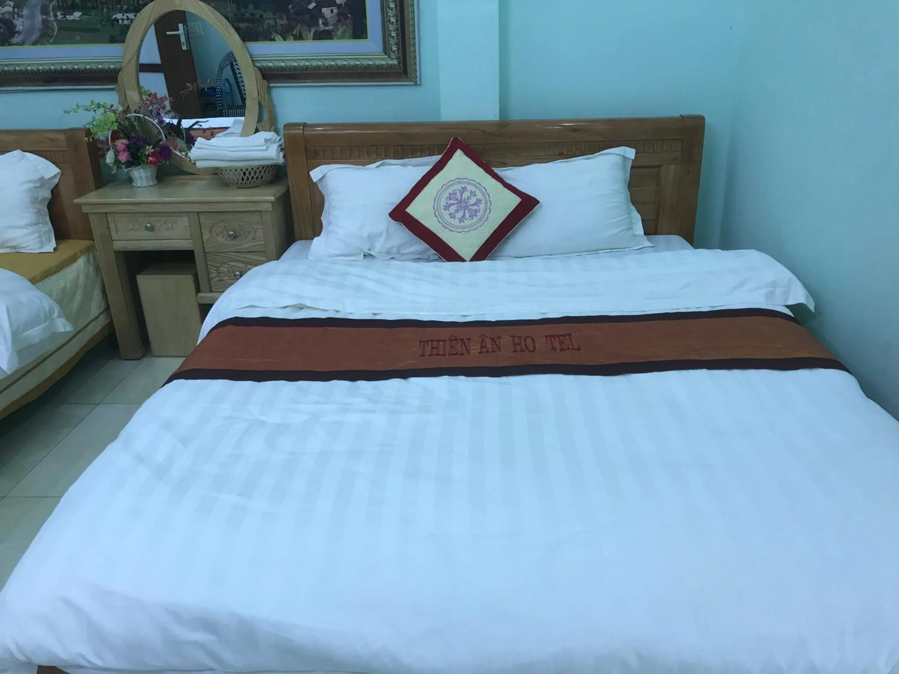 Bed in Yen Minh Hotel Thien An