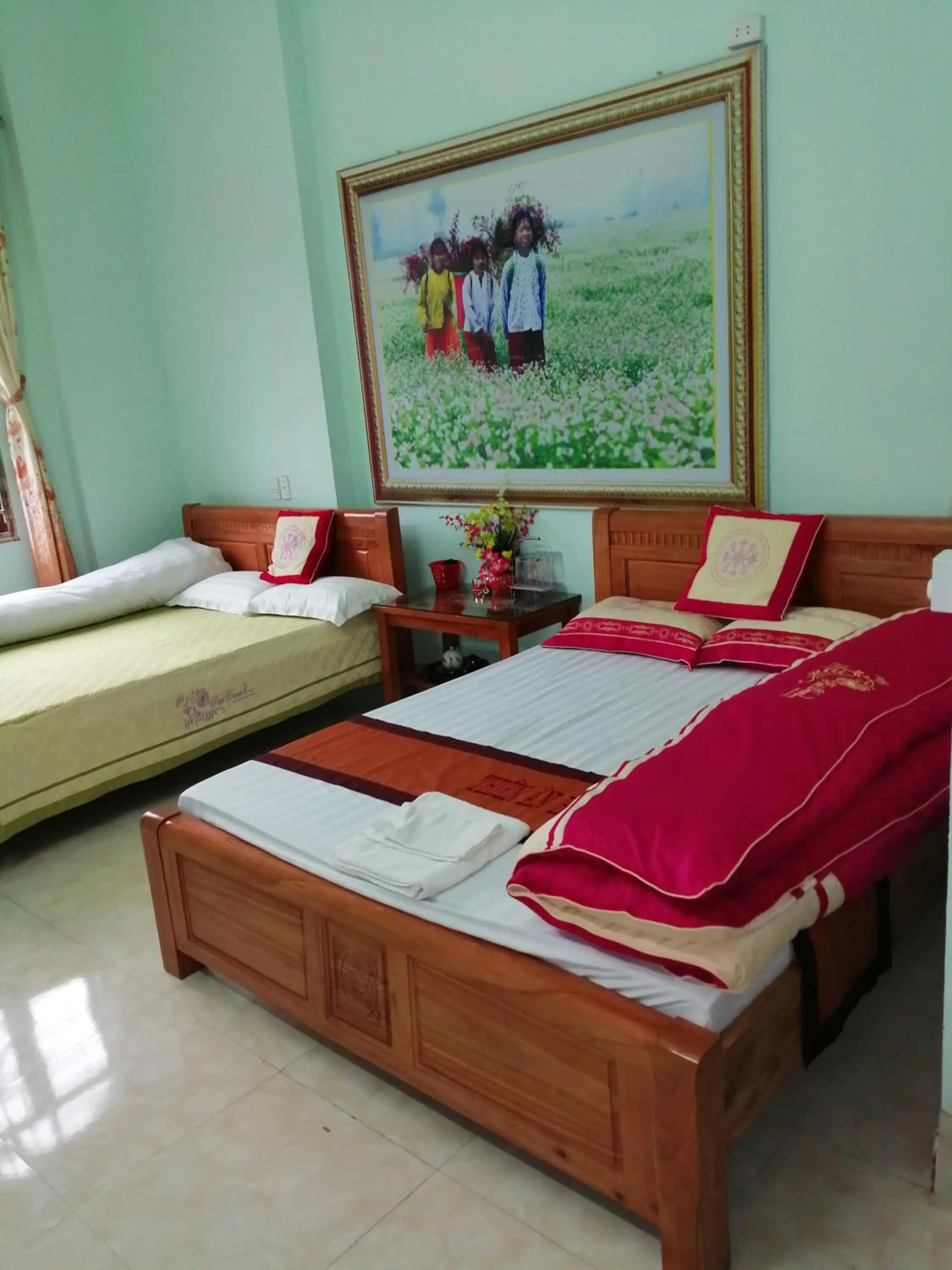 Bed in Yen Minh Hotel Thien An