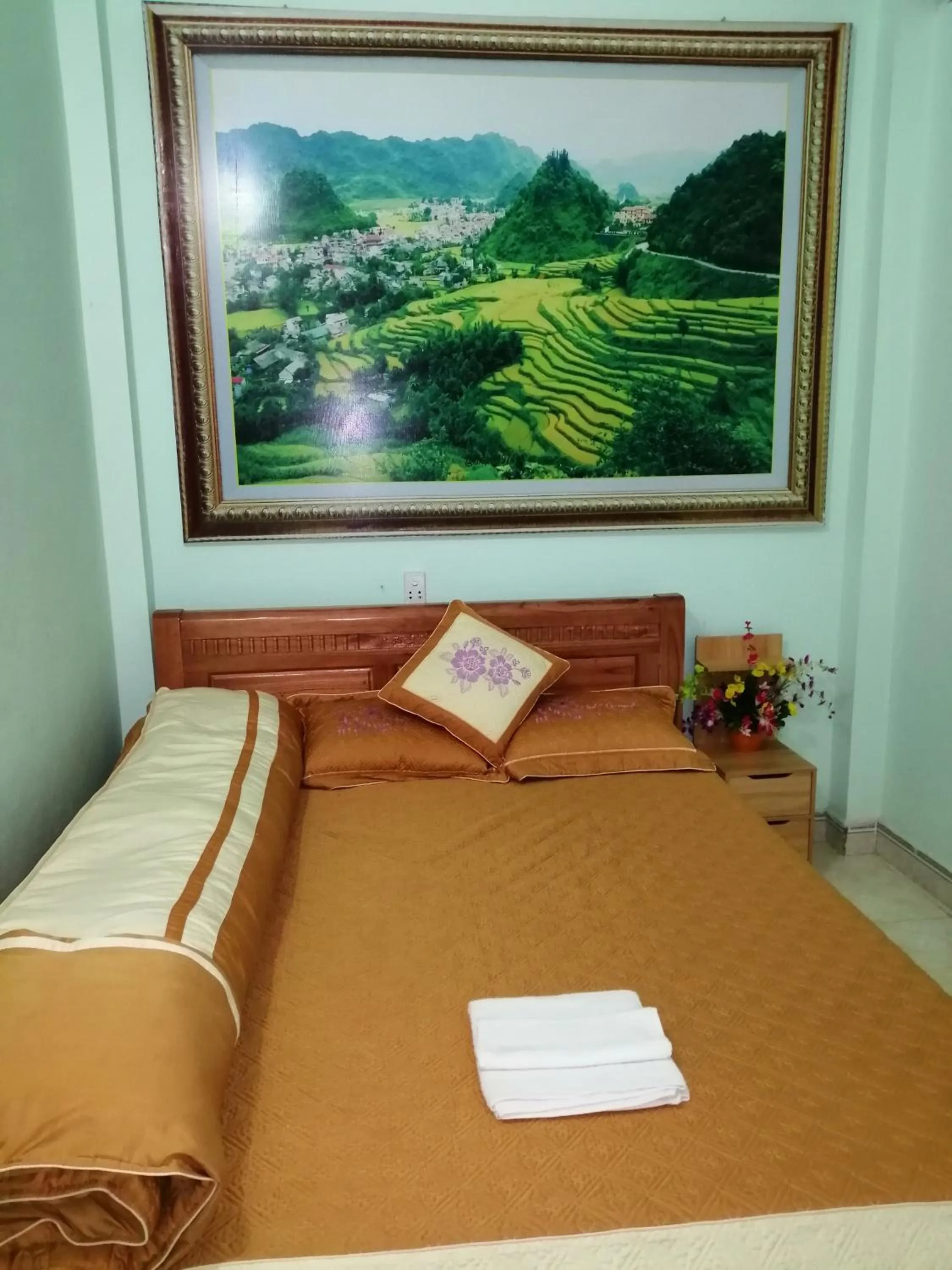 Bed in Yen Minh Hotel Thien An
