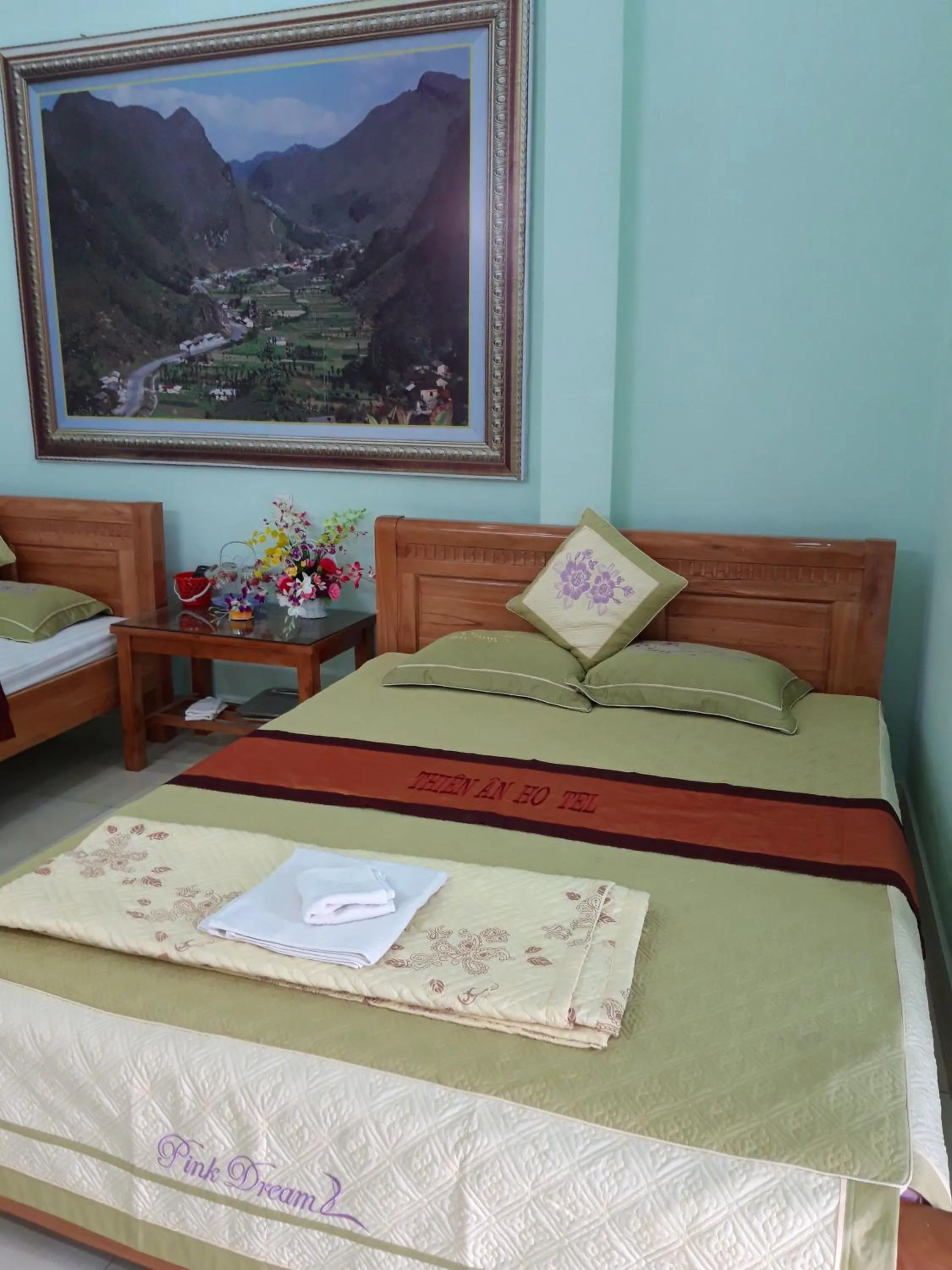 Bed in Yen Minh Hotel Thien An