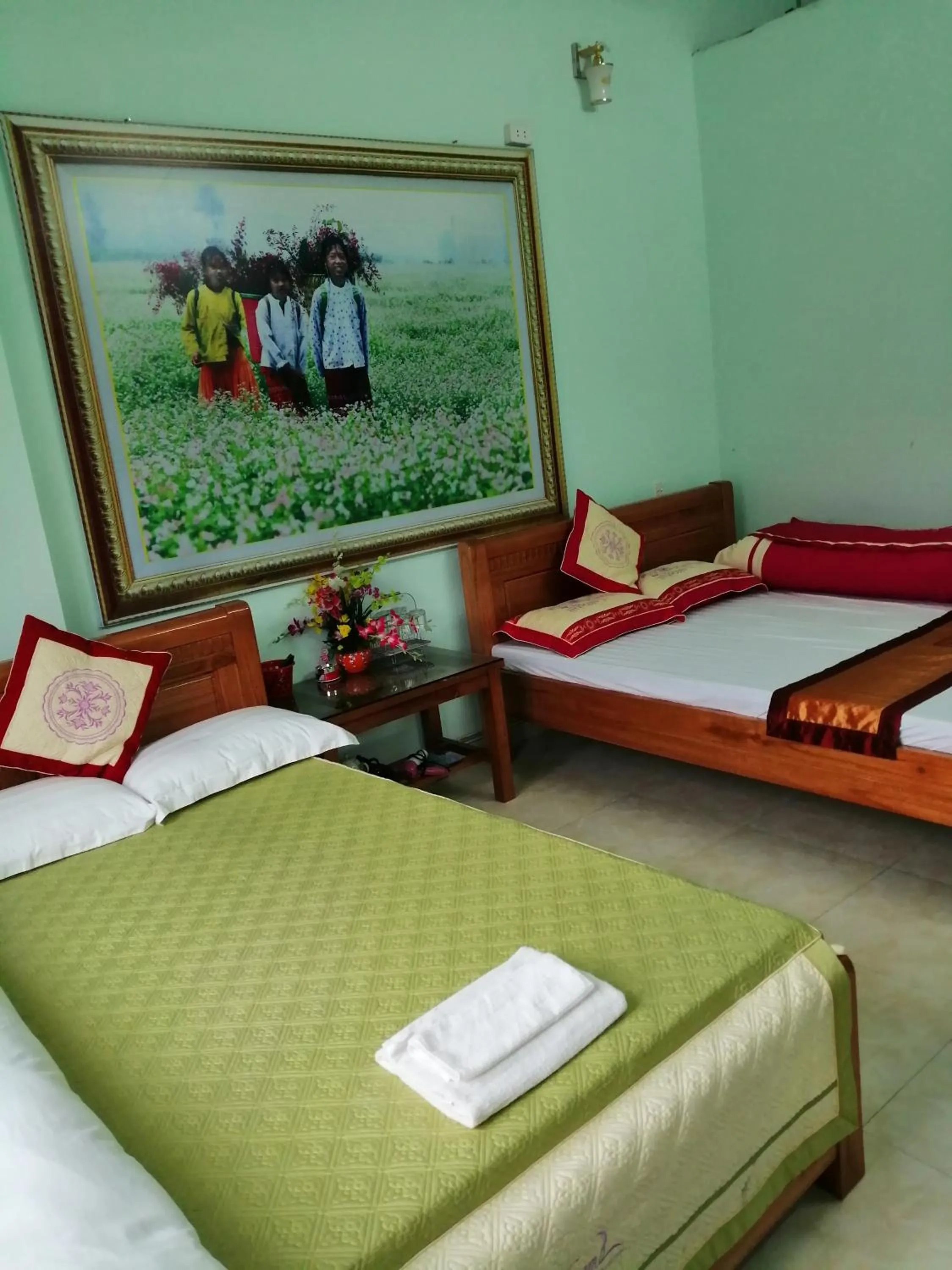 Bed in Yen Minh Hotel Thien An