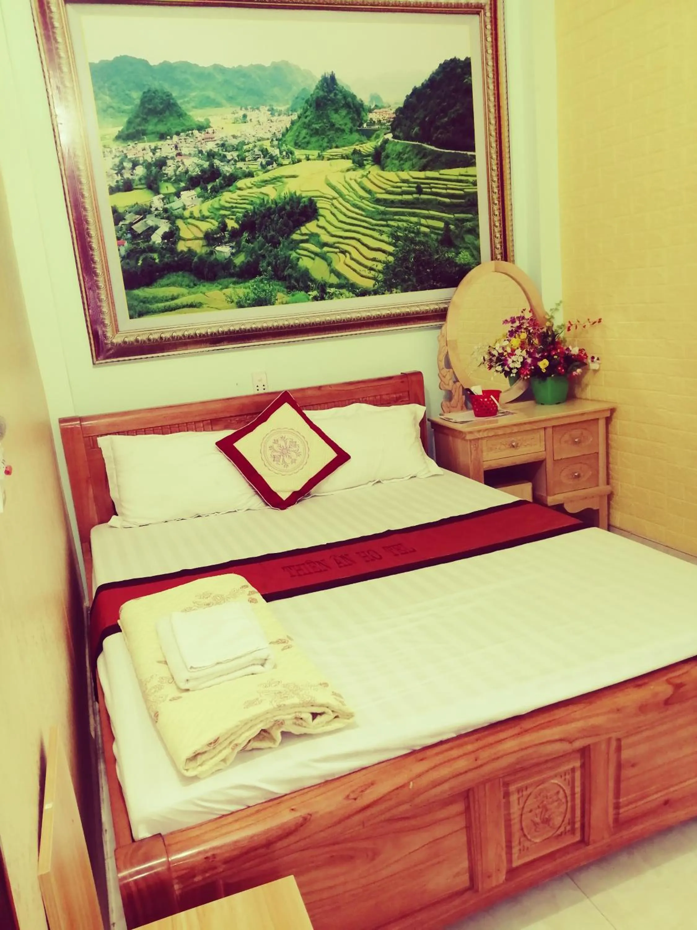 Bed in Yen Minh Hotel Thien An