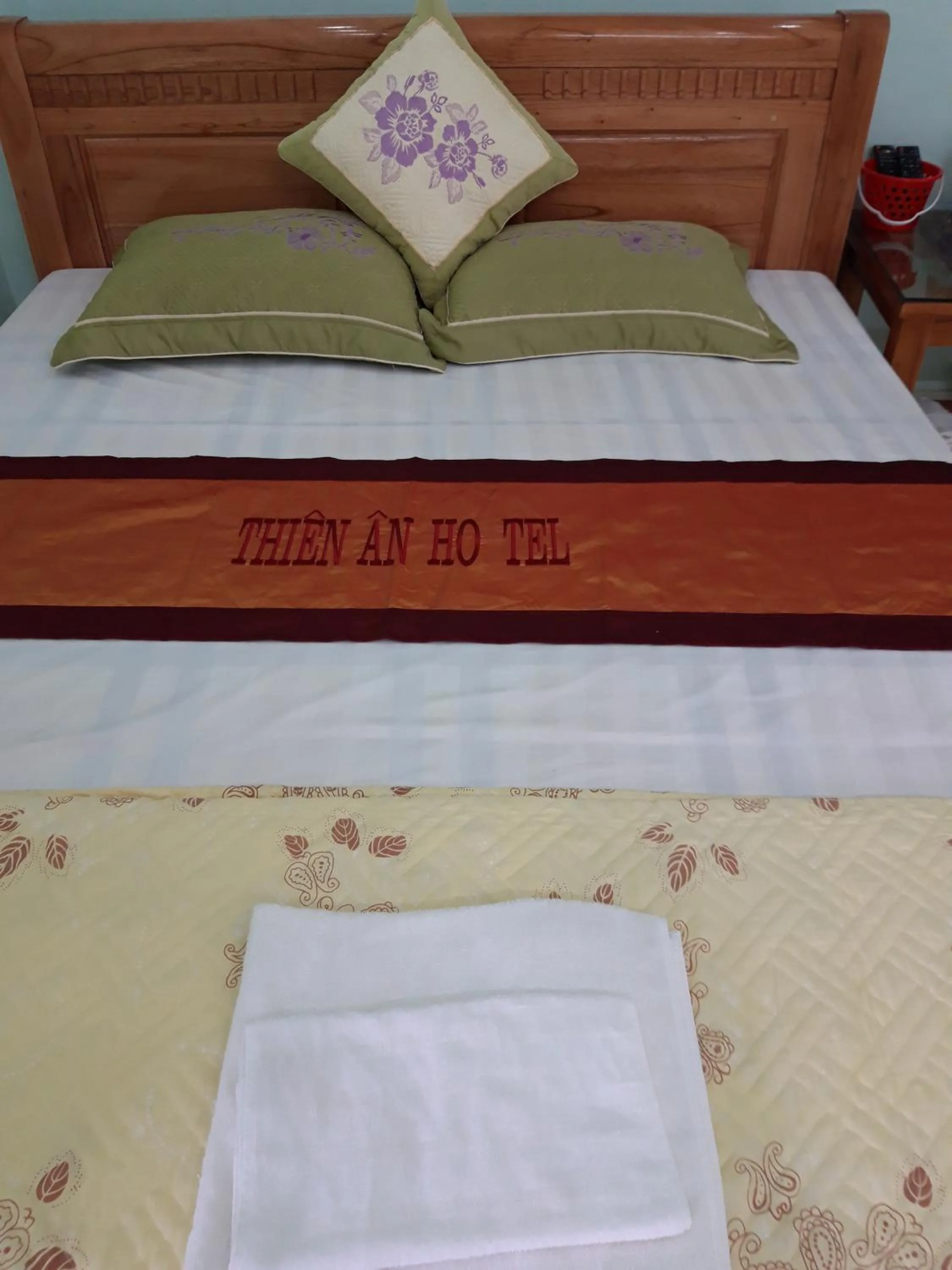 Bed in Yen Minh Hotel Thien An